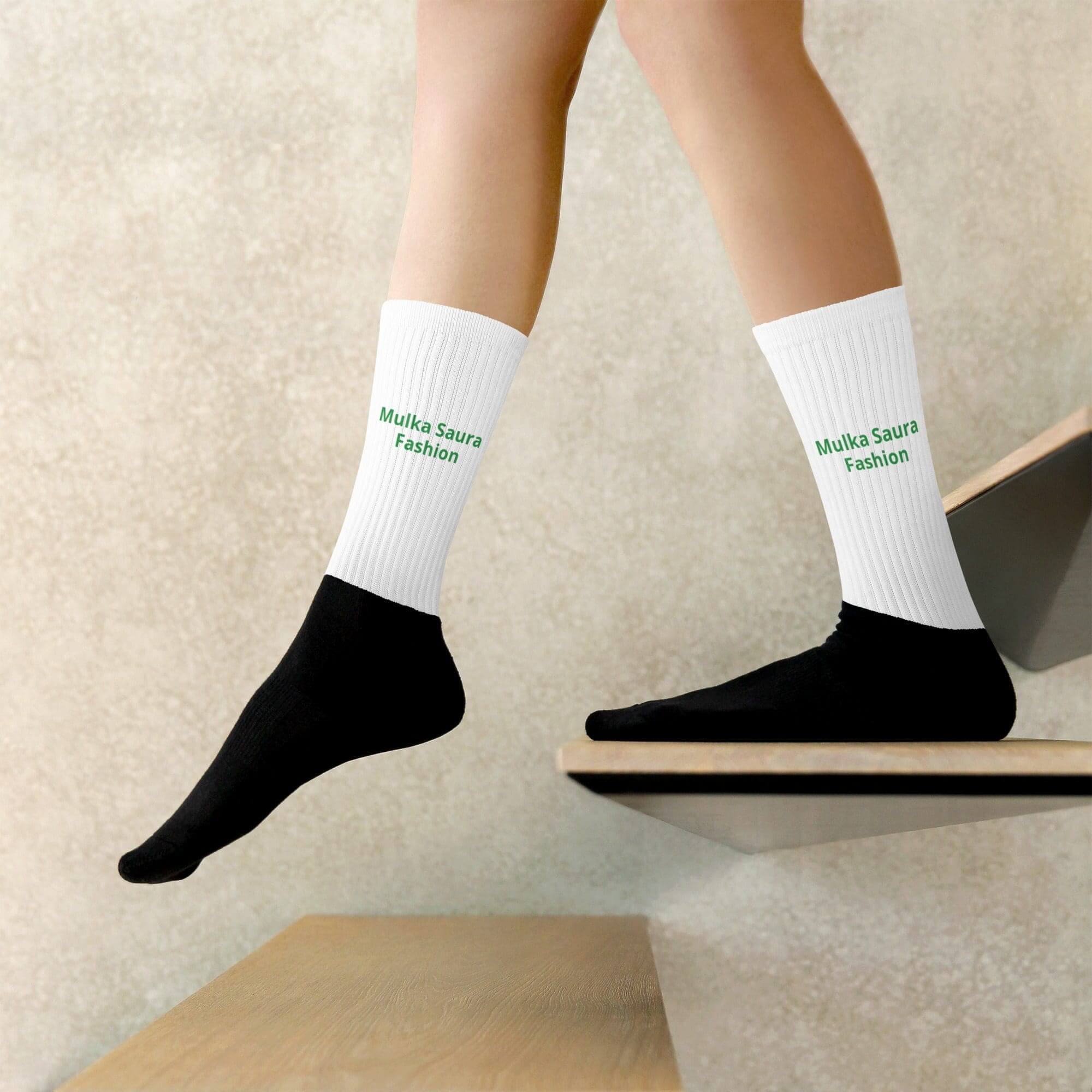 Person wearing socks on wooden steps.