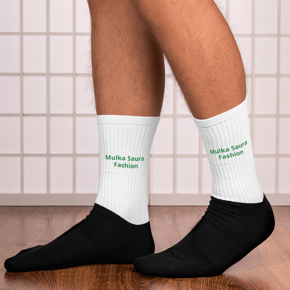 Person wearing white socks, black shoes.