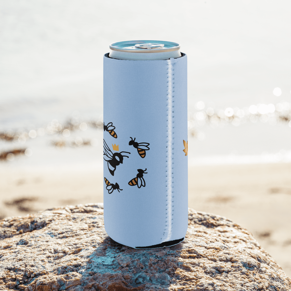 Can on rock with bee design.