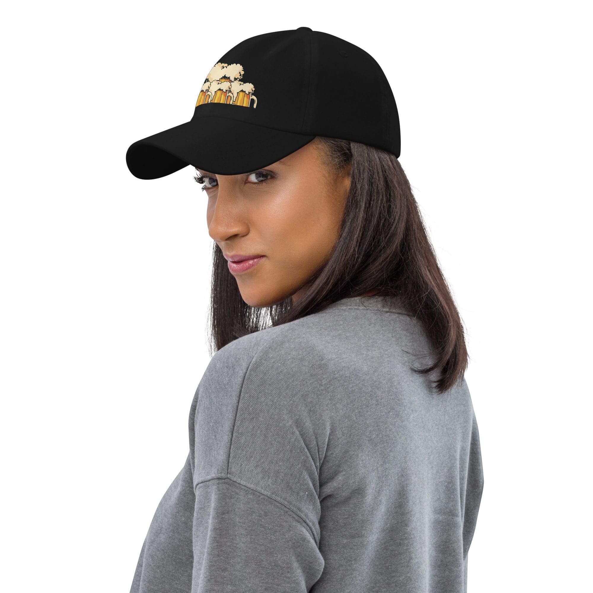 Woman wearing black cap with embroidery.