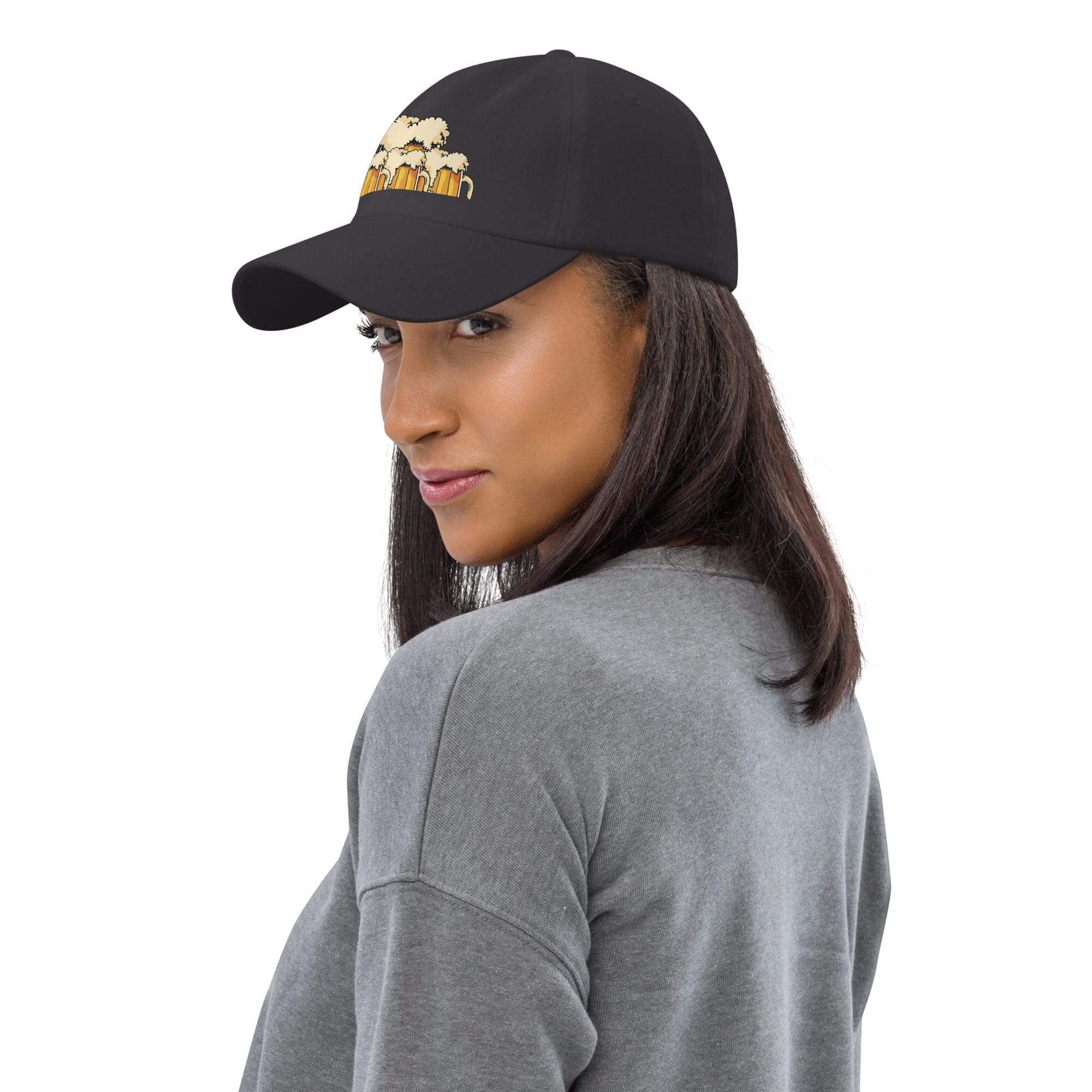 Woman wearing black cap with cartoon print.