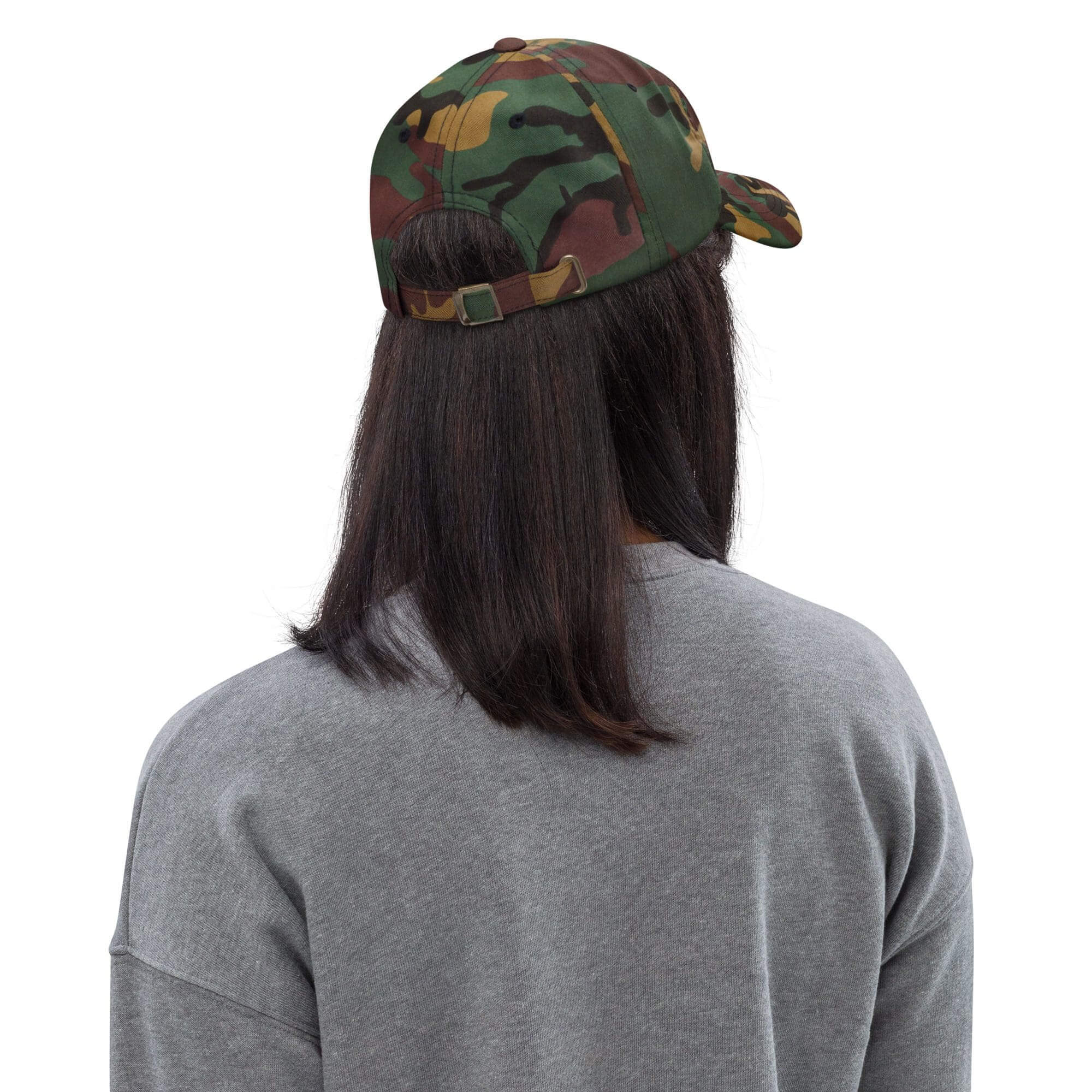 Person wearing camouflage cap, facing away.