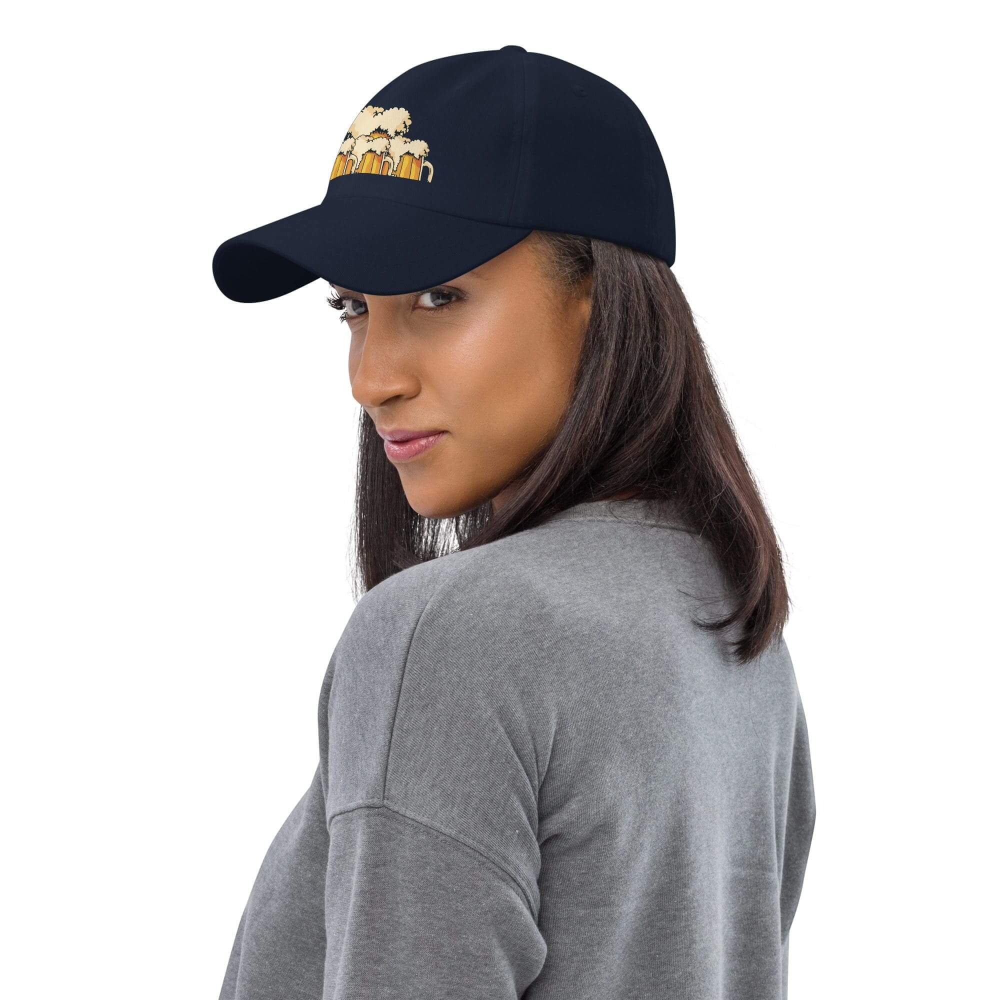 Woman wearing a navy baseball cap.