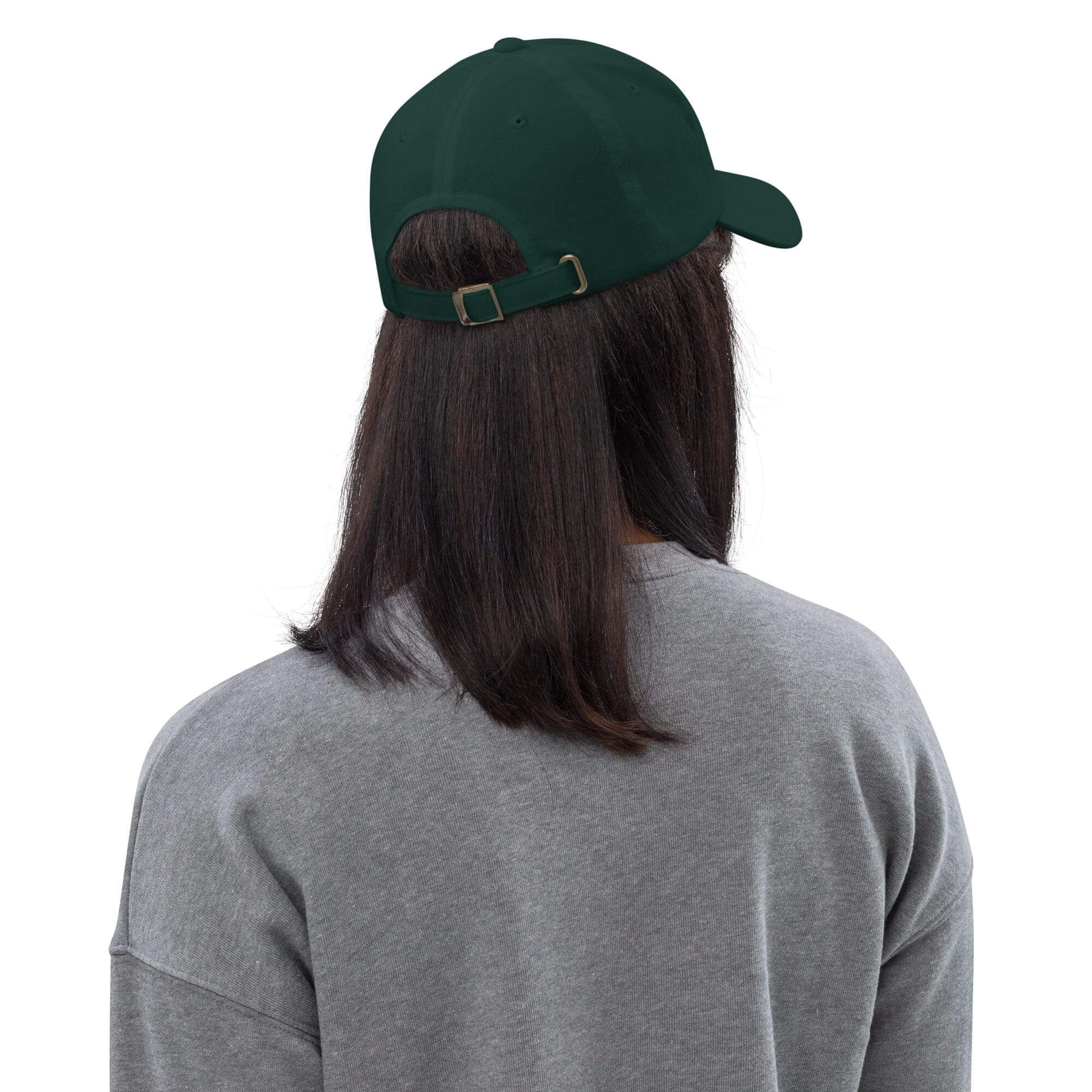 Person wearing green cap and gray shirt.