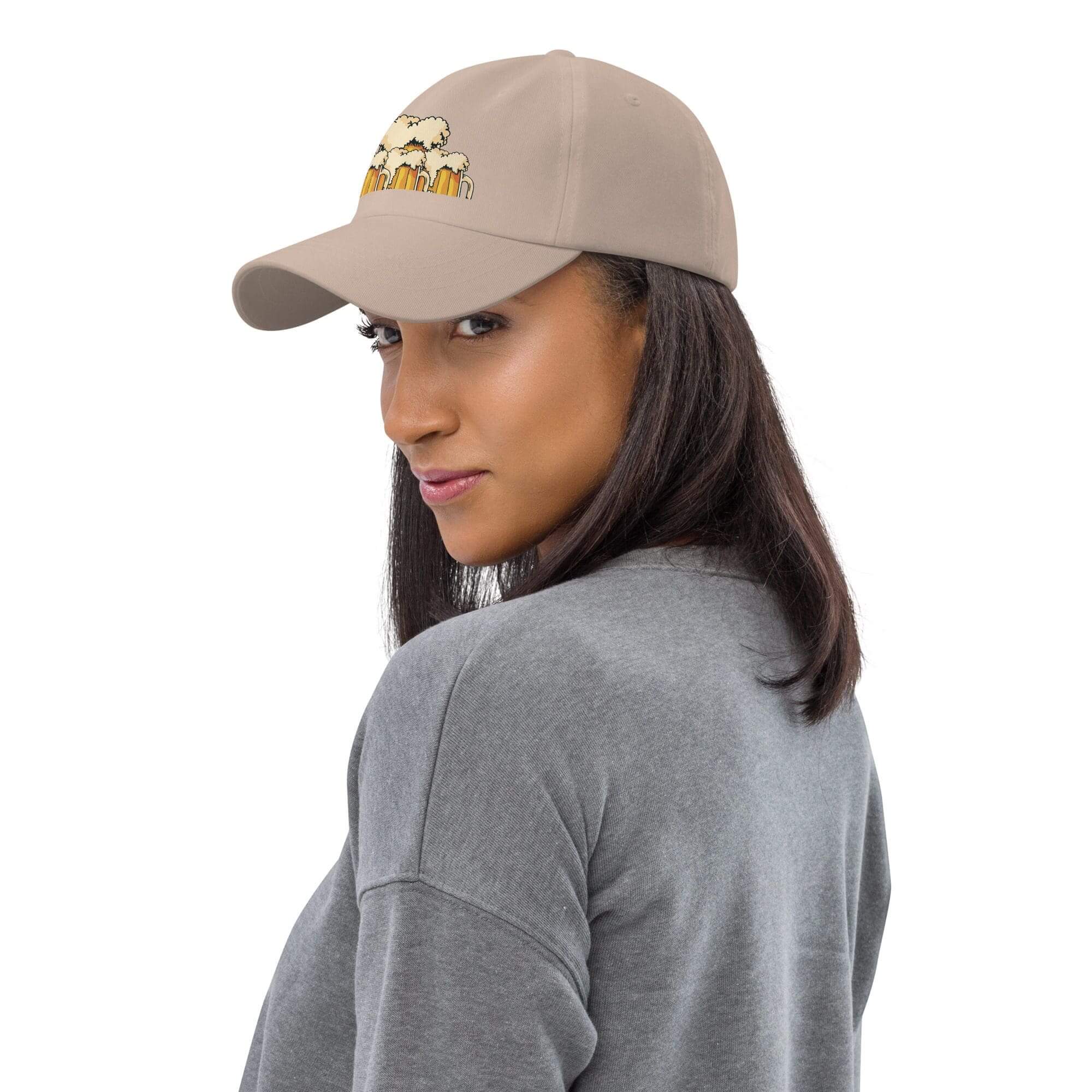 Woman in cap with embroidered design.
