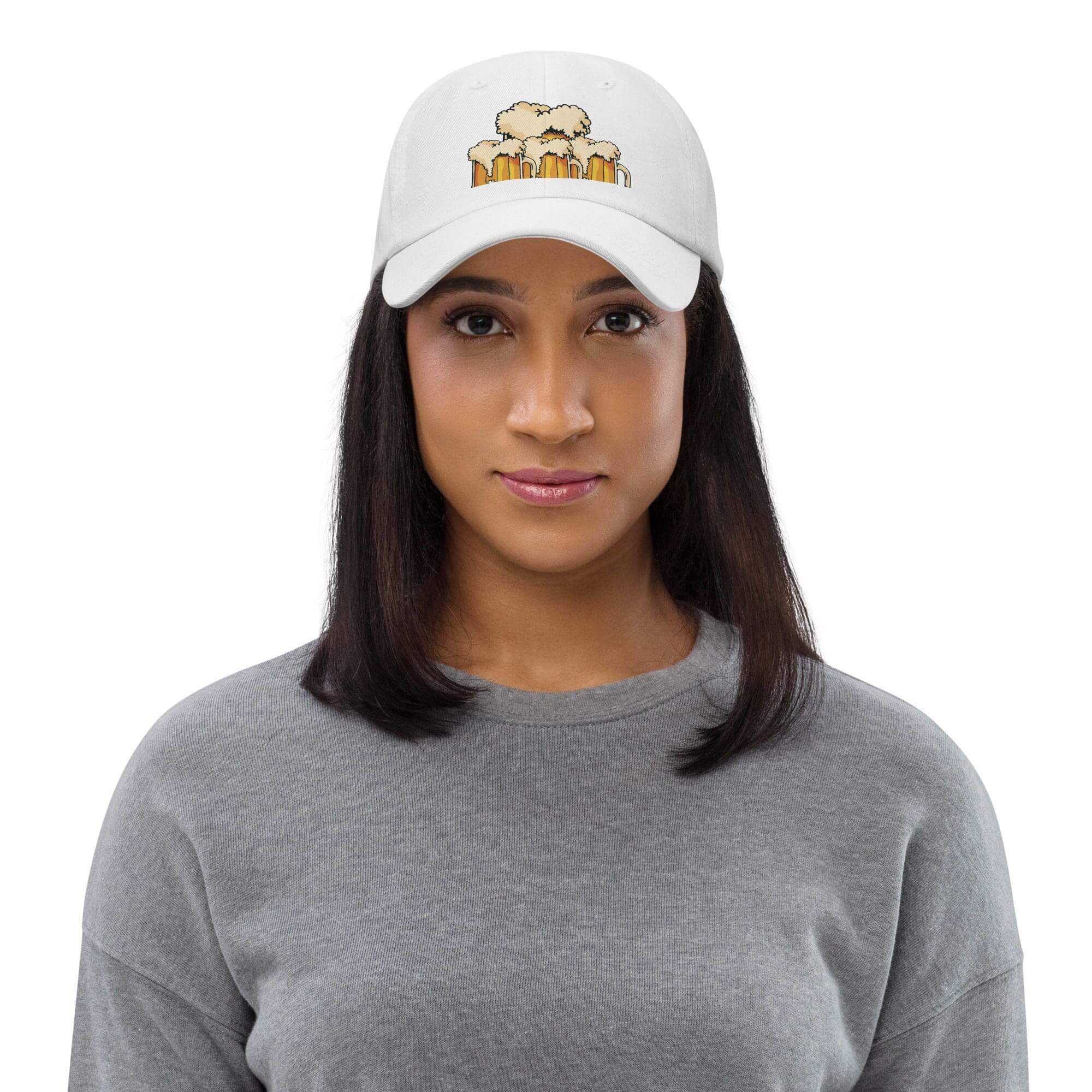 Woman wearing a white embroidered cap.
