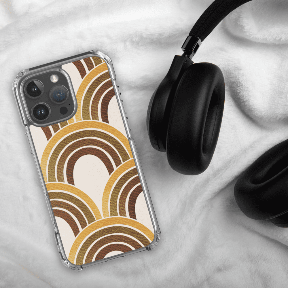 Phone with patterned case and black headphones.