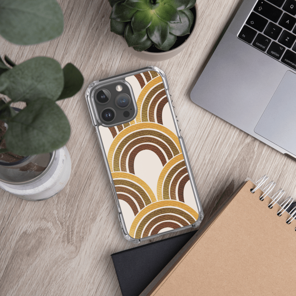 Phone with patterned case on desk.