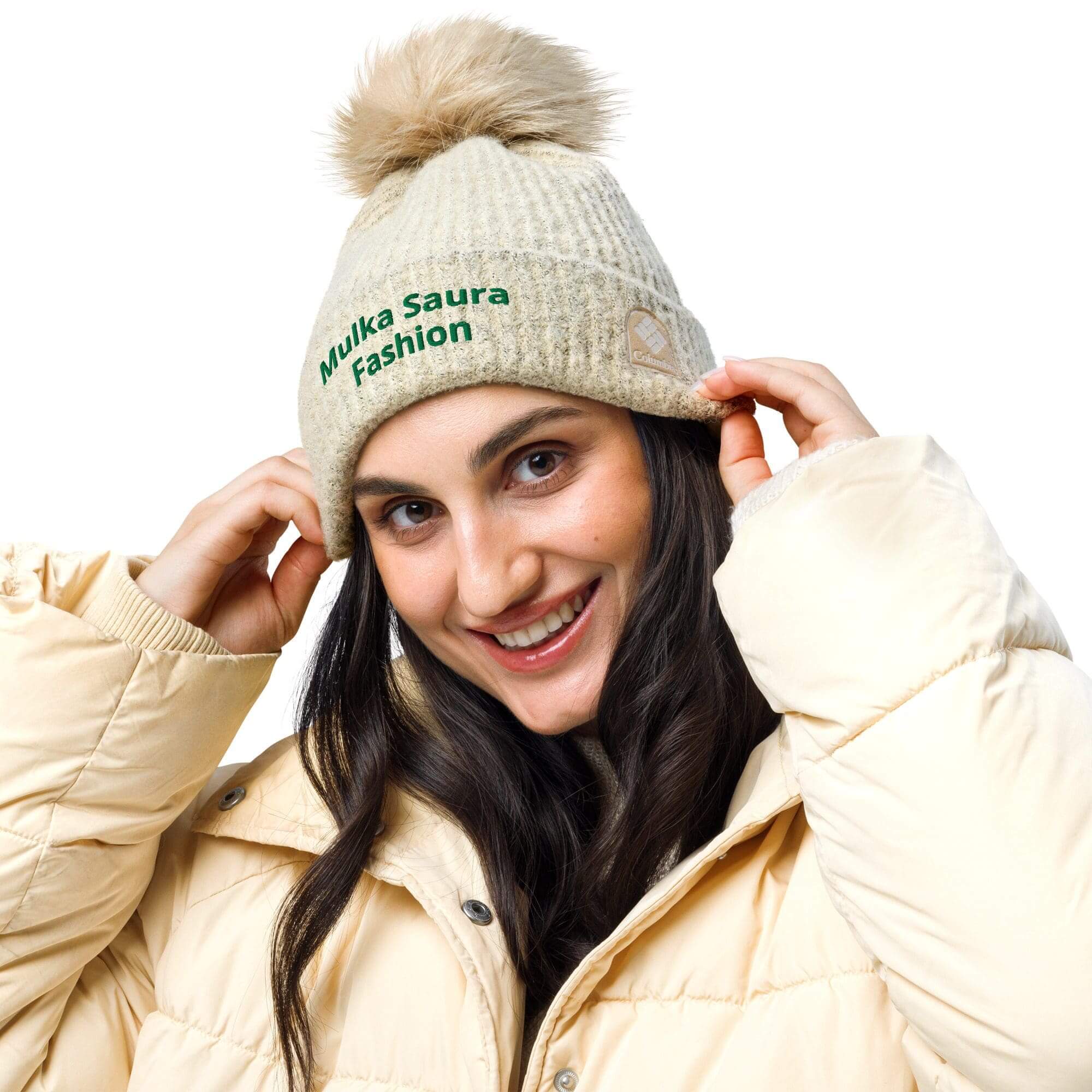 Woman in winter coat and knit hat.