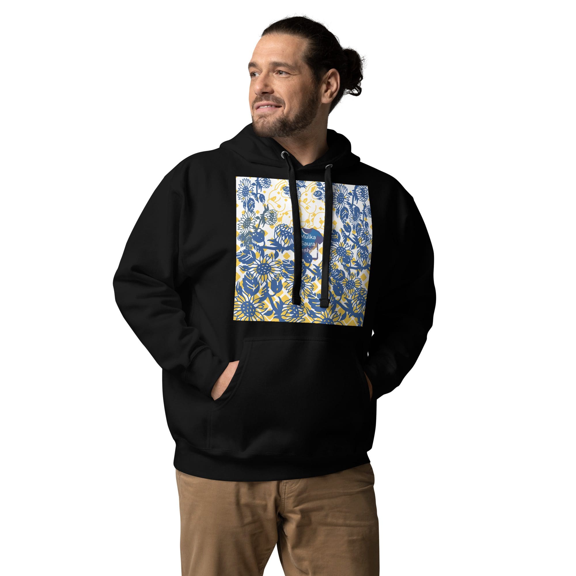 Man wearing floral-patterned hoodie, looking sideways.