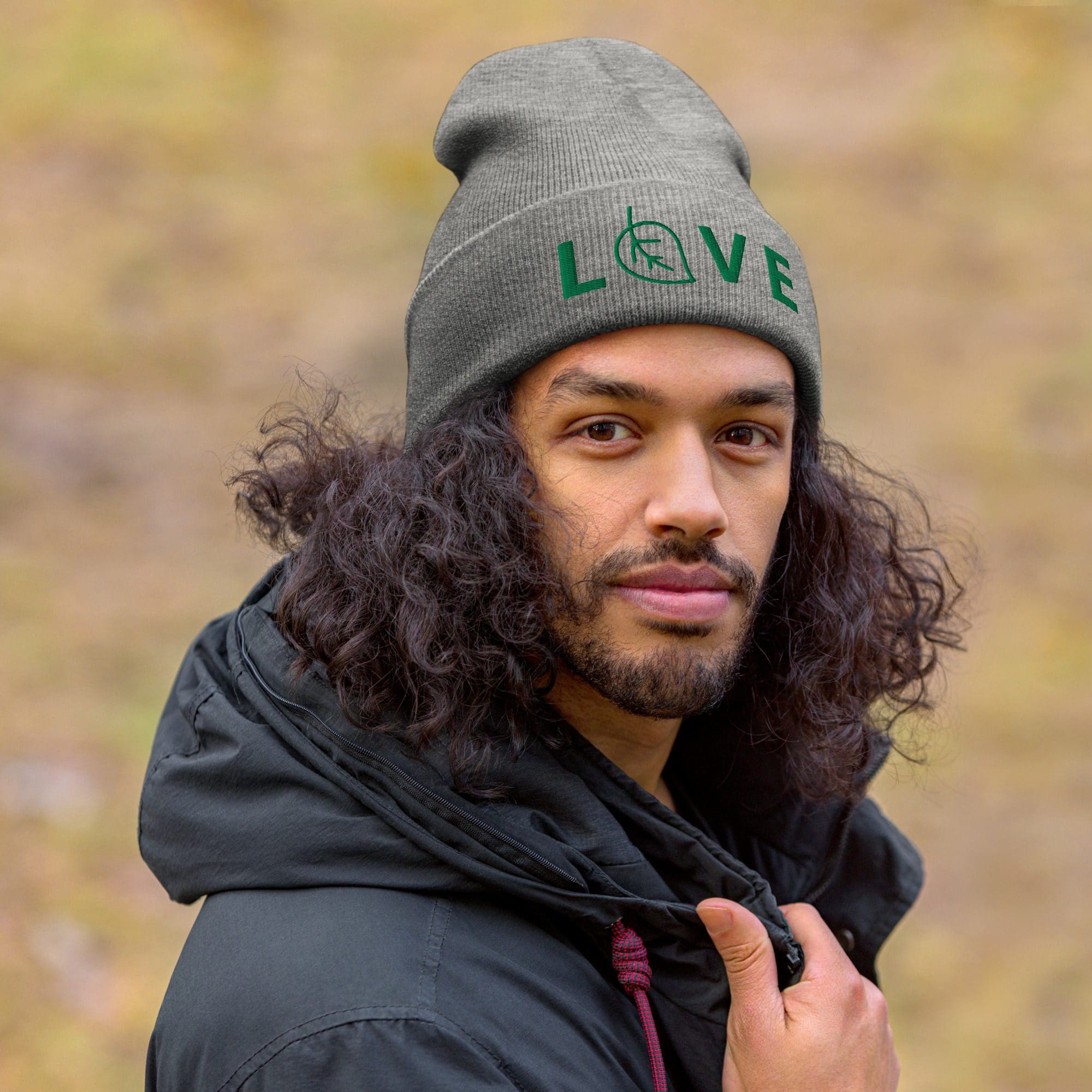 Person wearing a hat with "LOVE" logo.