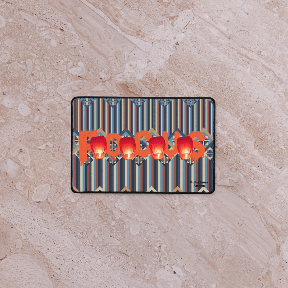 Rectangular rug with "Focus" and apples design.