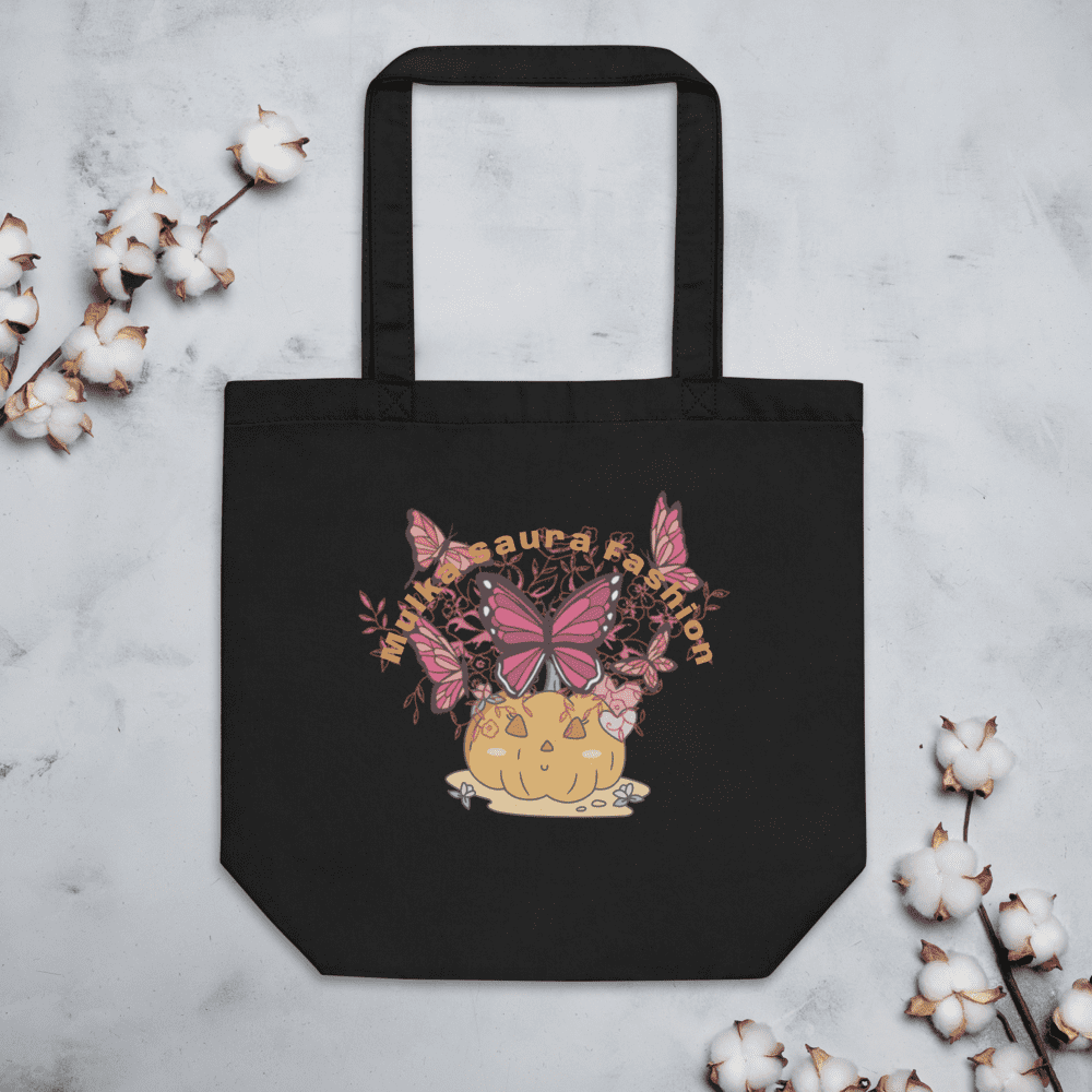 Black tote bag with butterfly design.