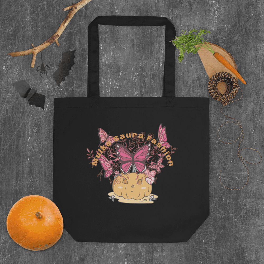 Tote bag with butterfly and pumpkin design.