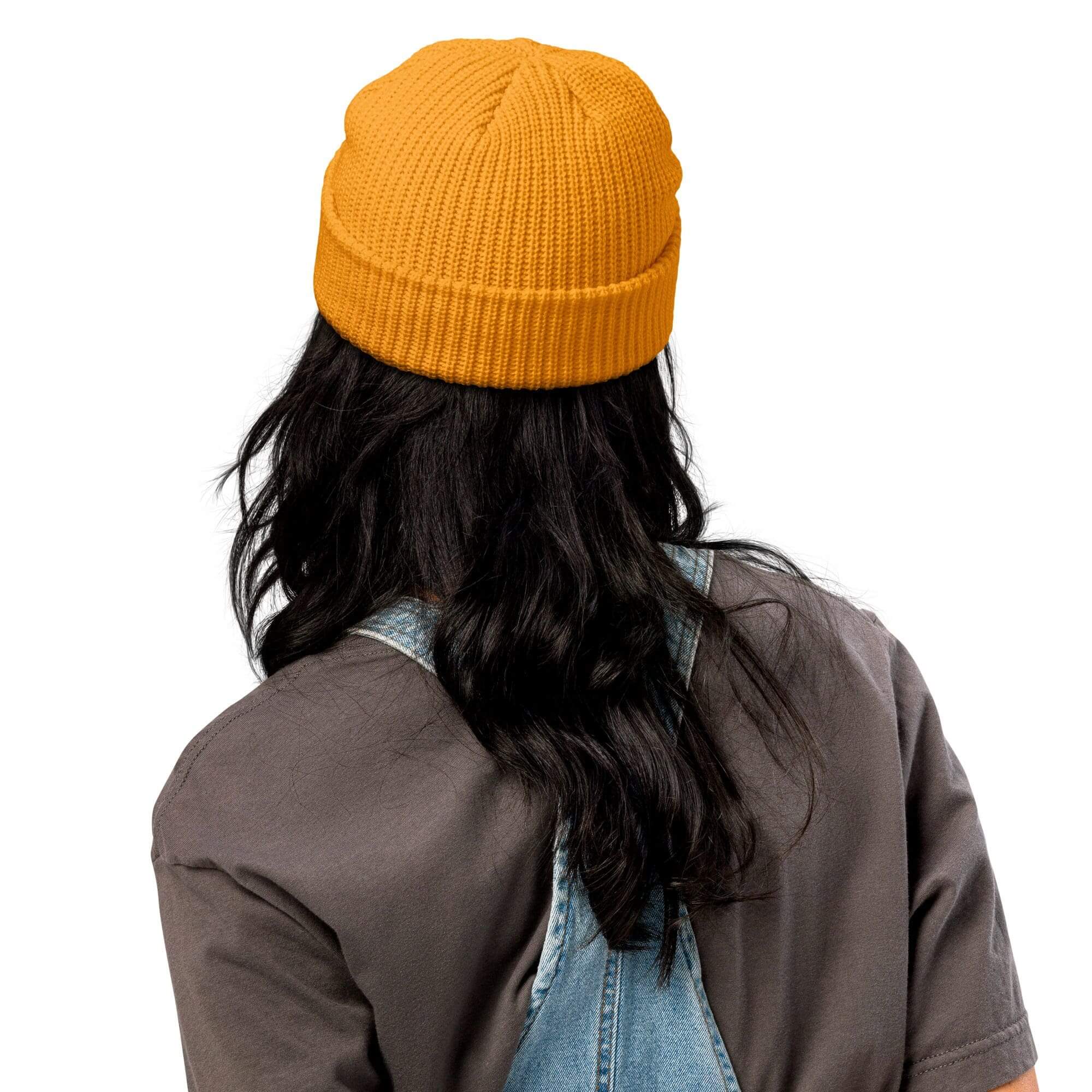 Person in orange beanie, back view.