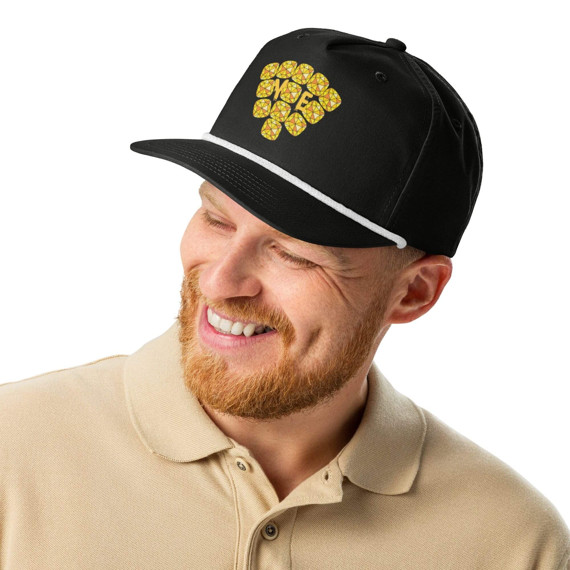 Man wearing black cap with yellow design.
