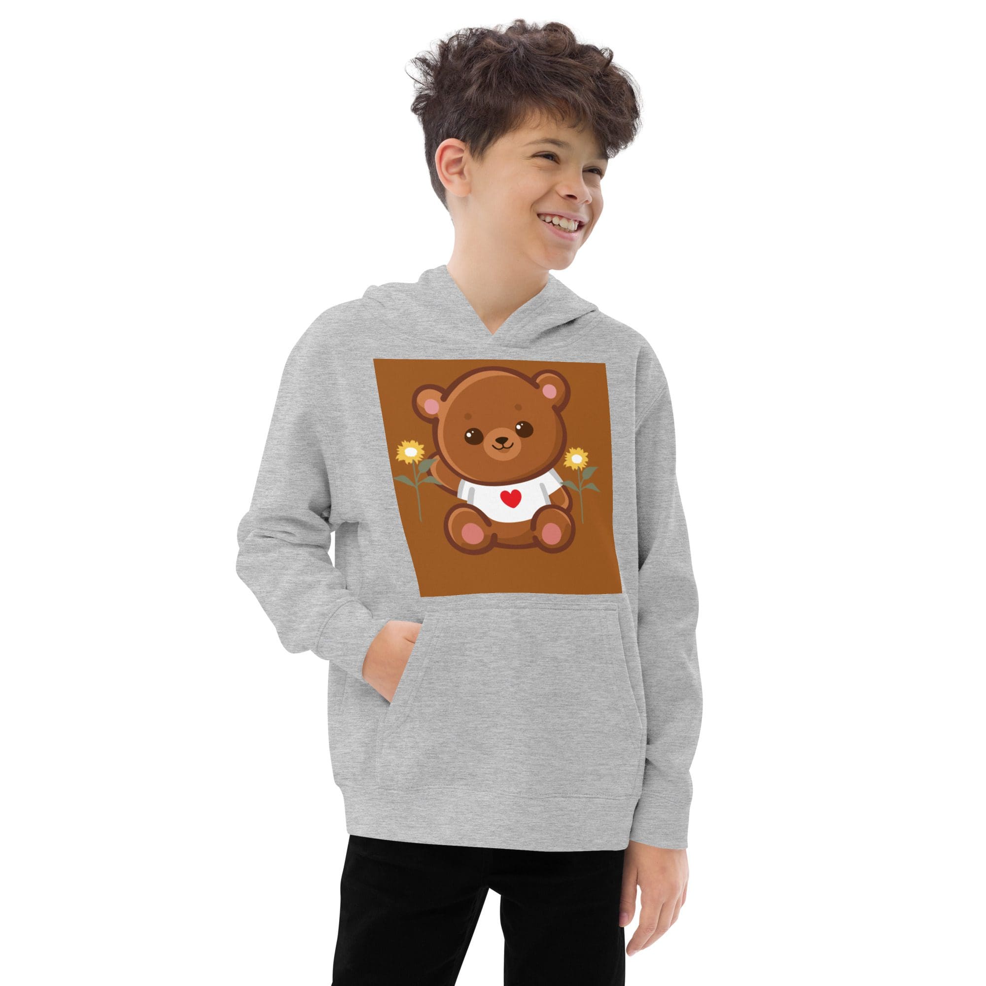 Smiling boy wearing hoodie with teddy bear print