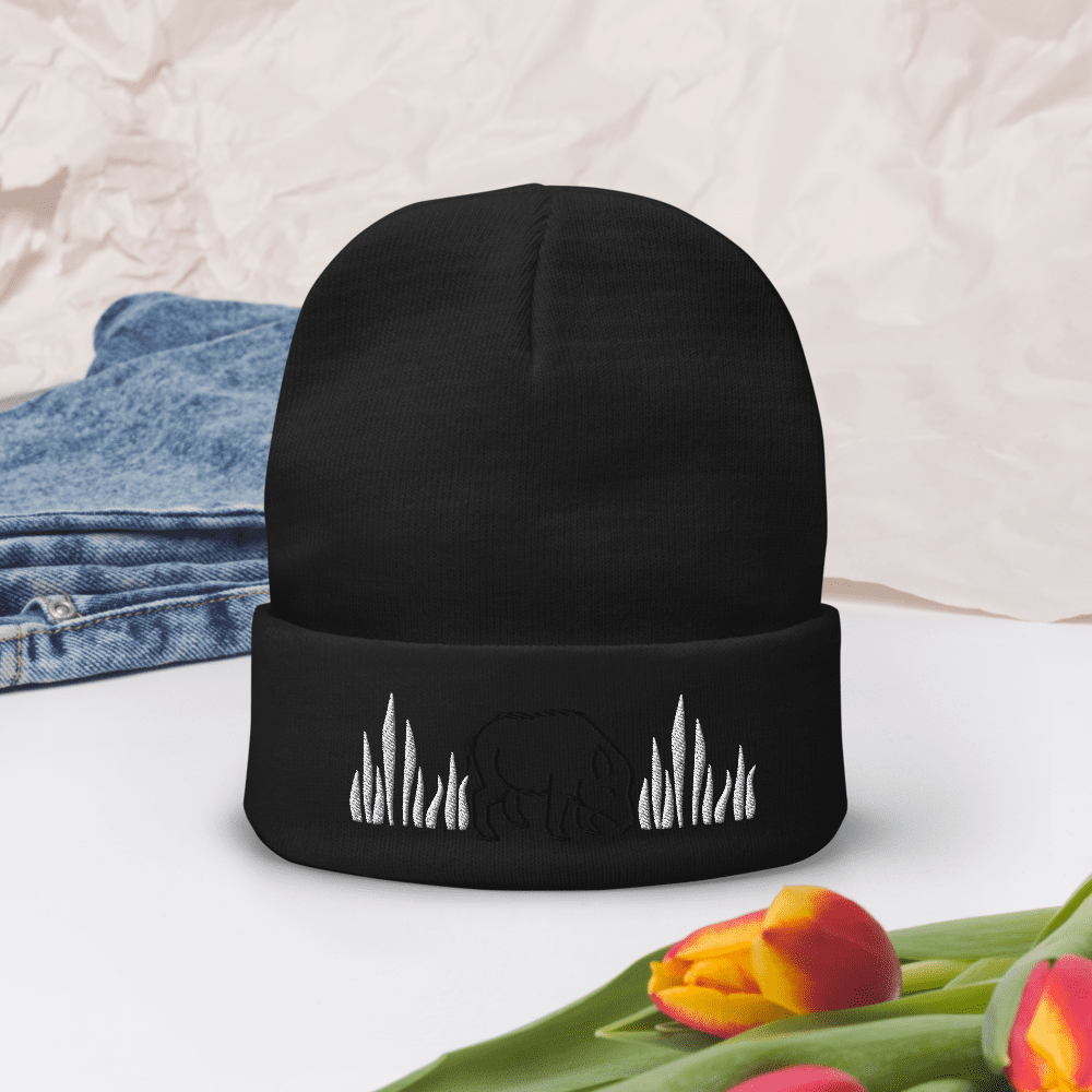 Black beanie with bear embroidery design.