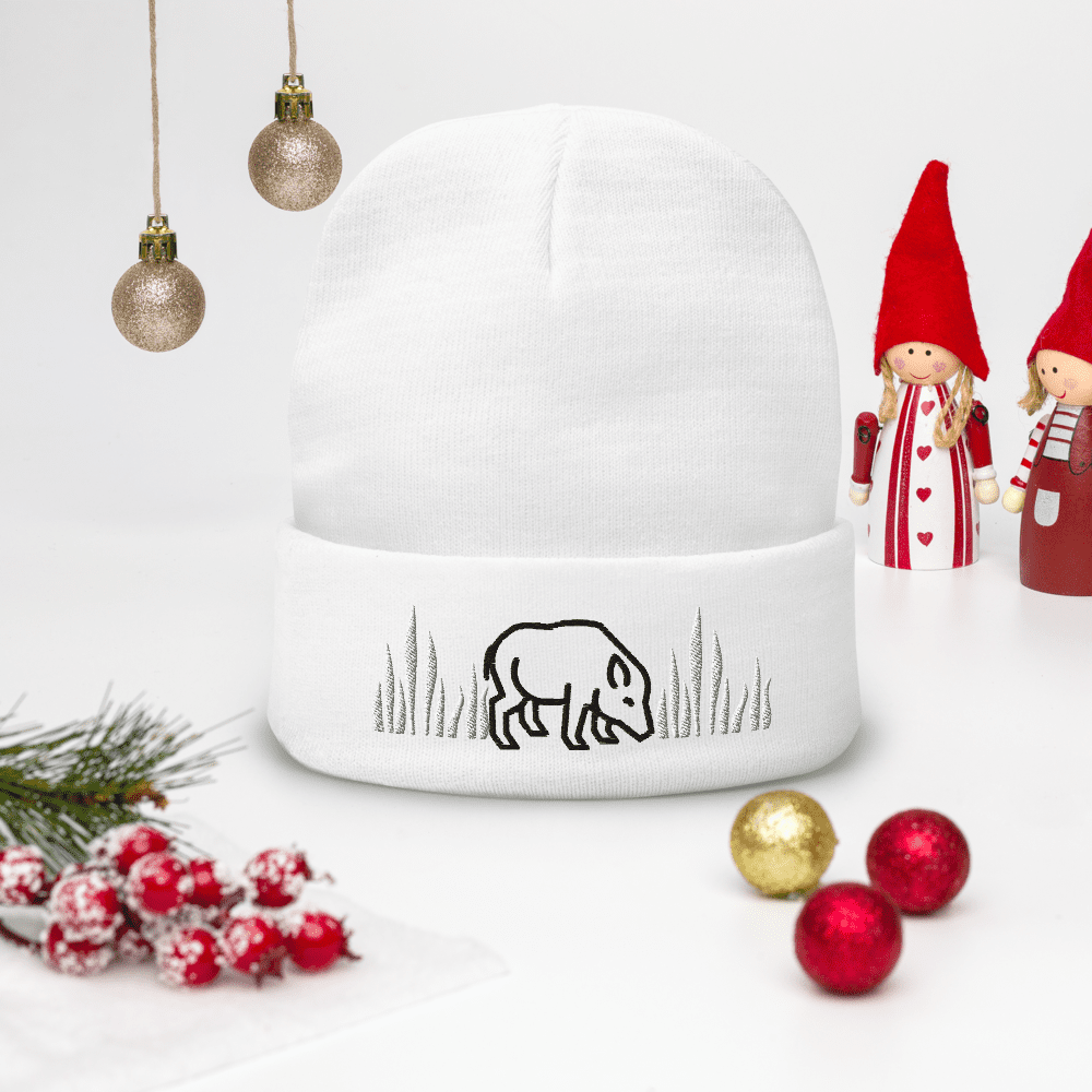 White beanie with festive holiday decorations.