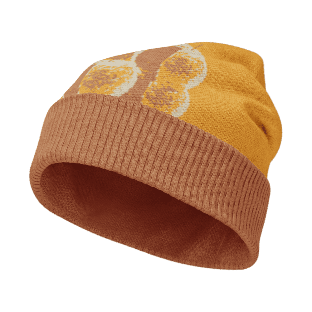 Orange knit hat with patterned design.