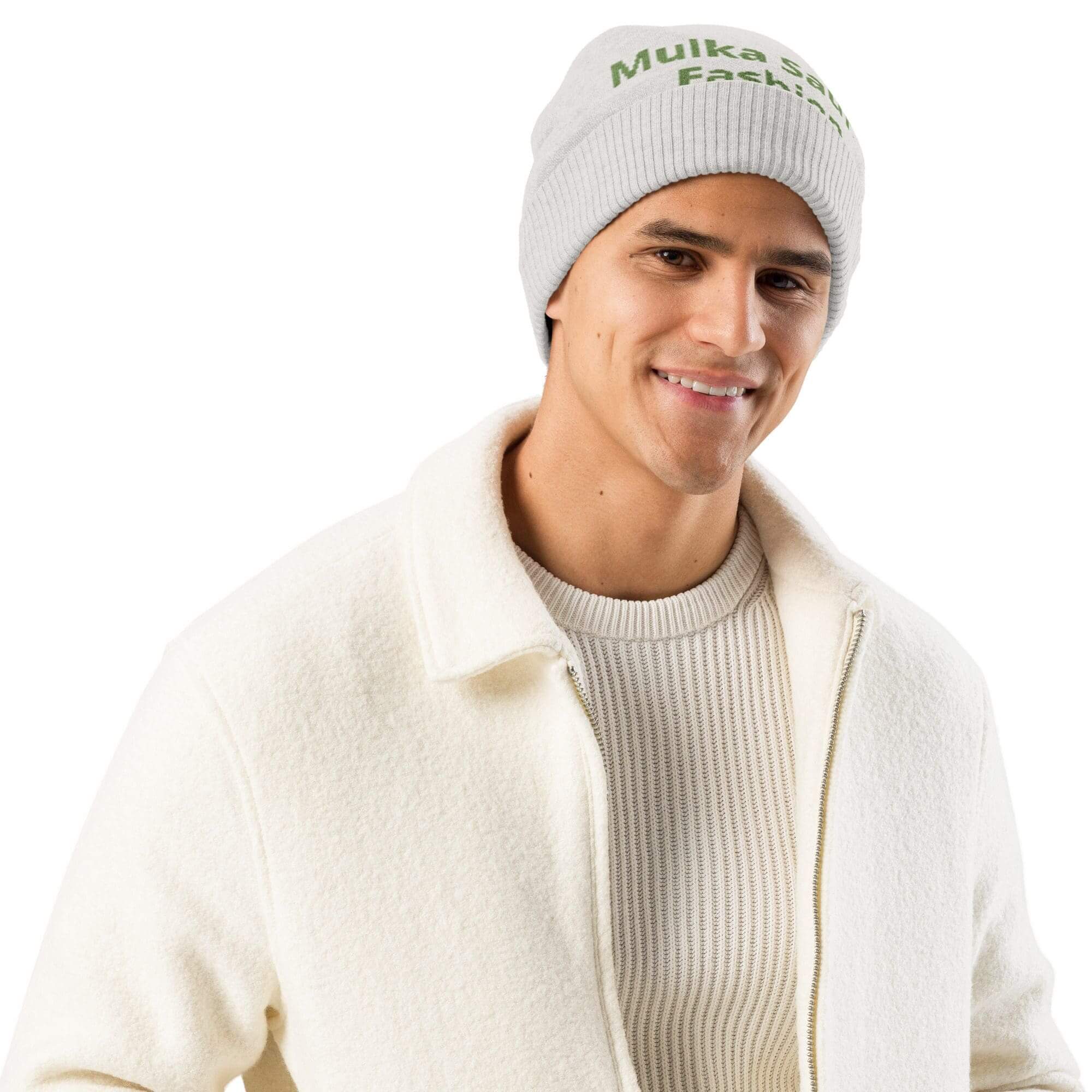 Man wearing white sweater and grey beanie.