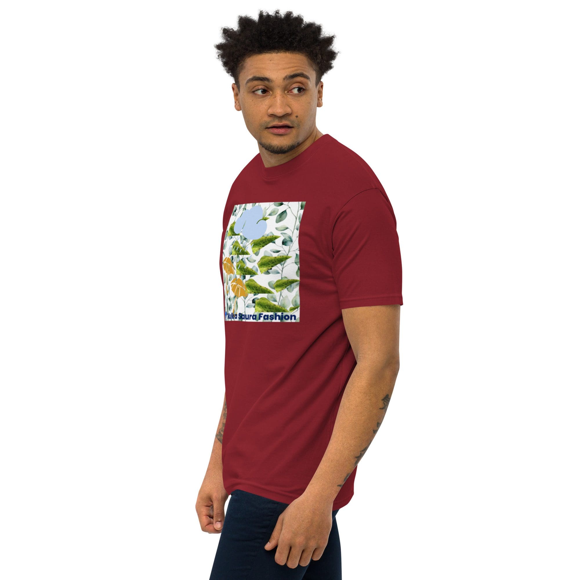 Man wearing red t-shirt with graphic design.