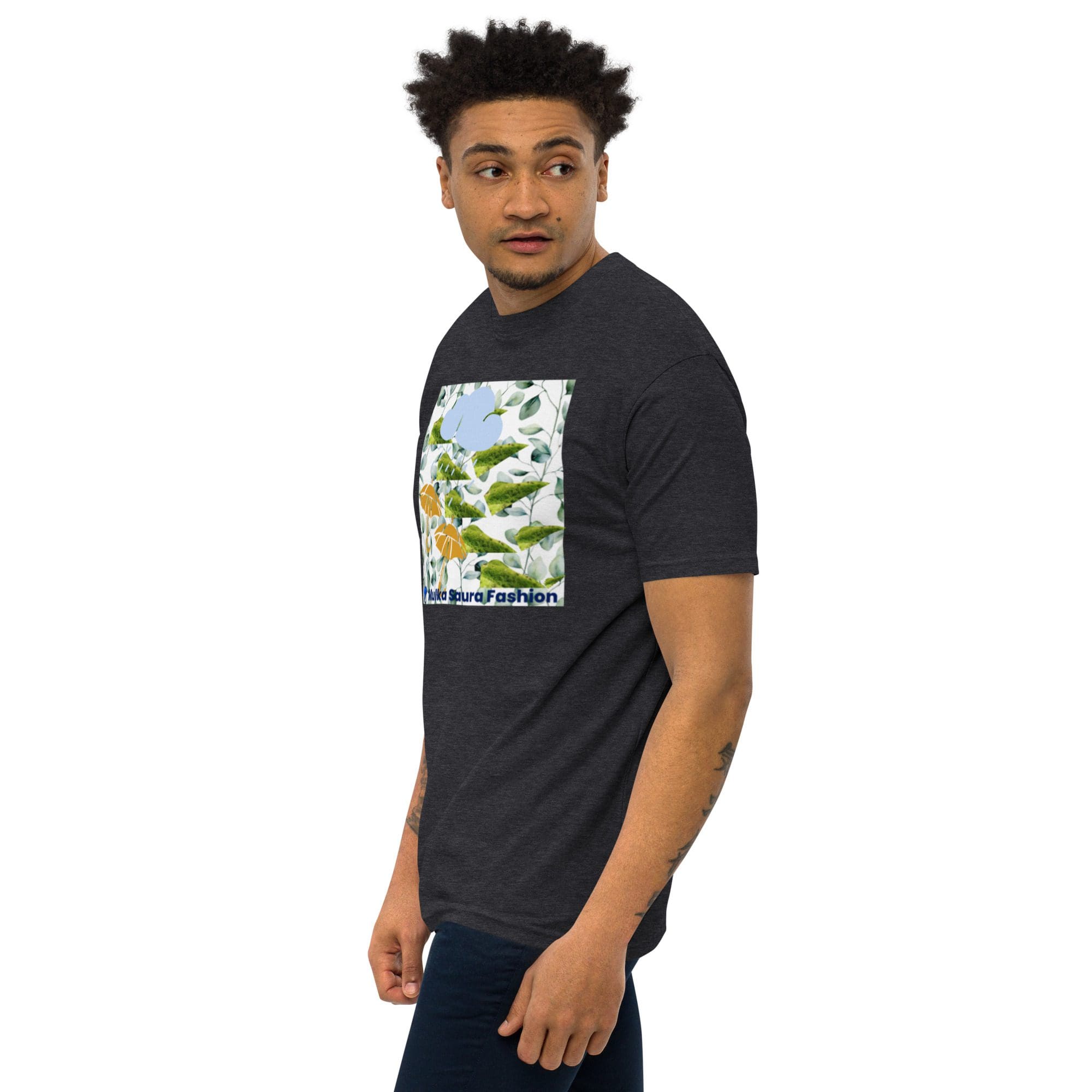 Man in dark graphic t-shirt looking sideways