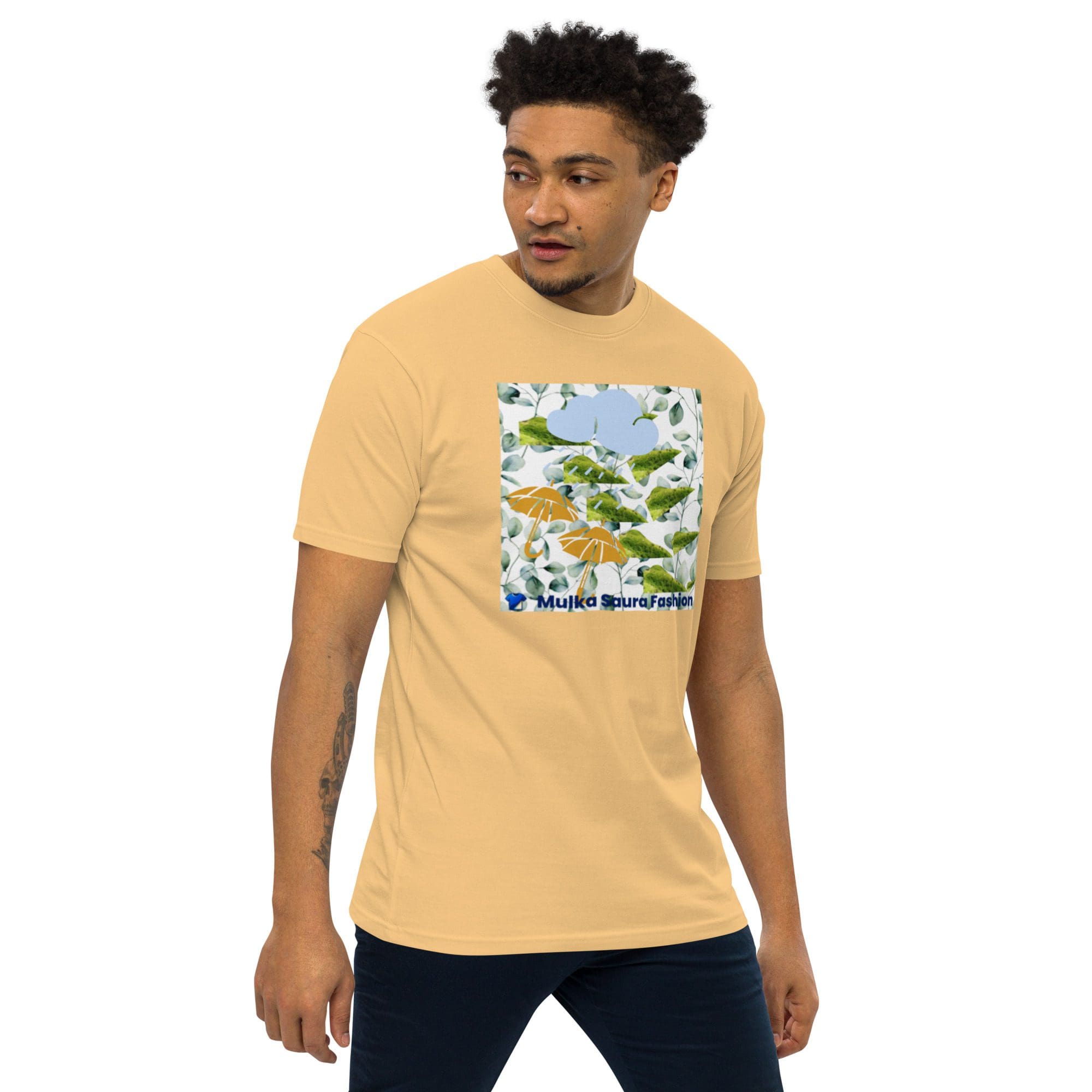 Man wearing a graphic t-shirt, looking sideways.