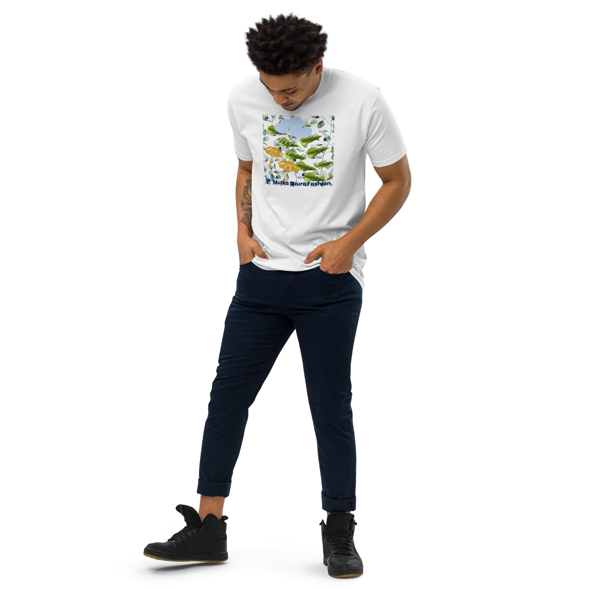 Man looking down wearing botanical graphic tee