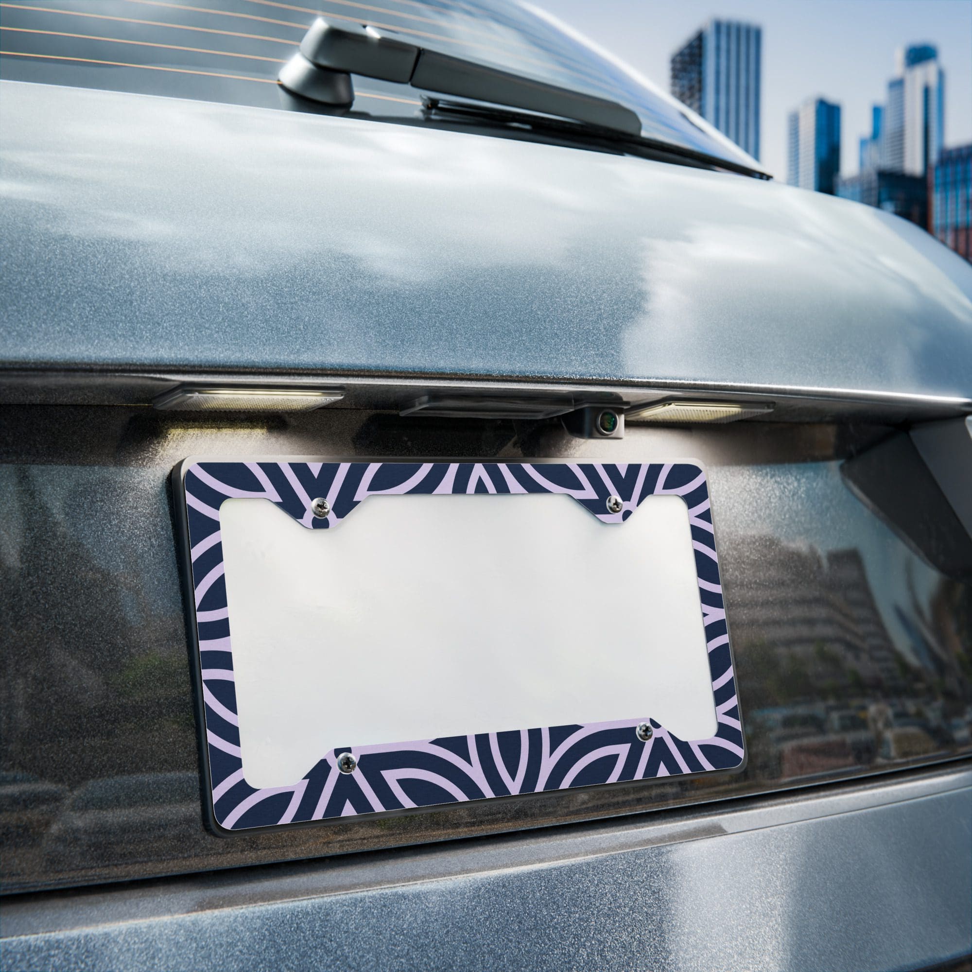 Car with decorative license plate holder.