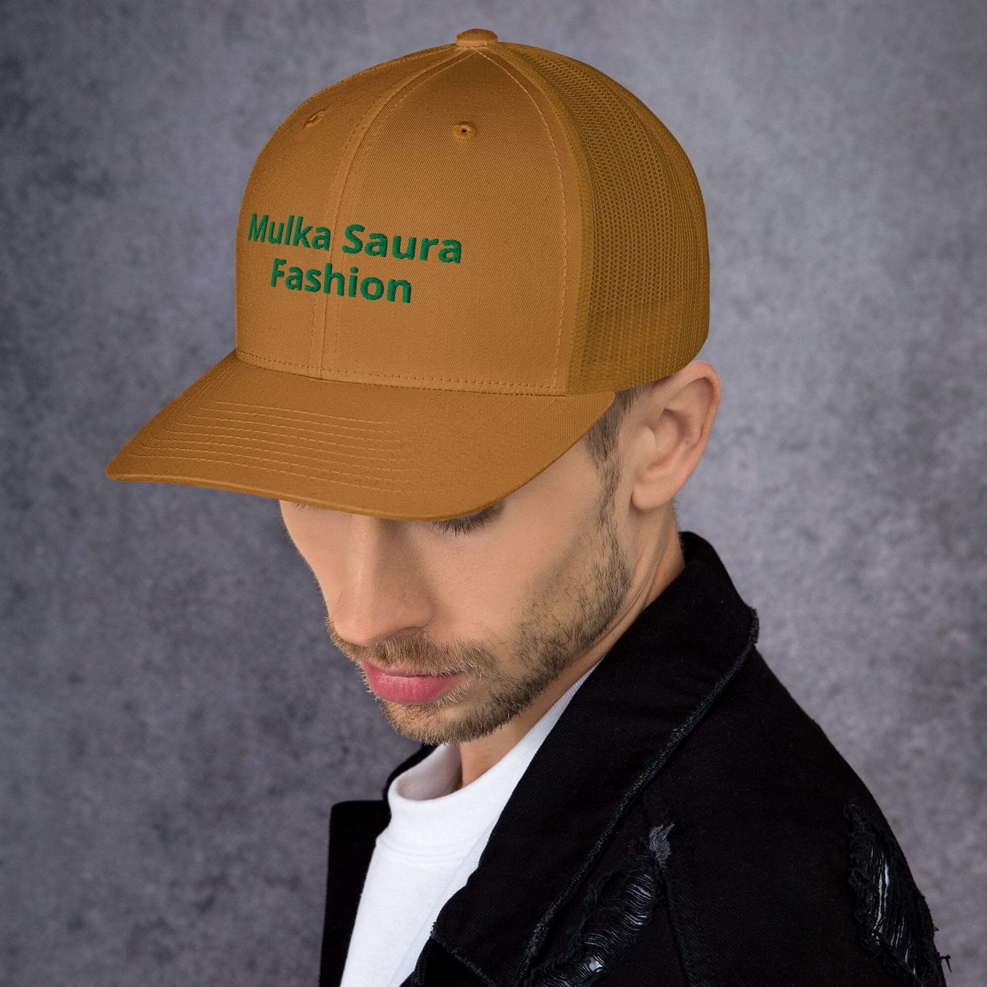 Man in brown cap, black jacket.