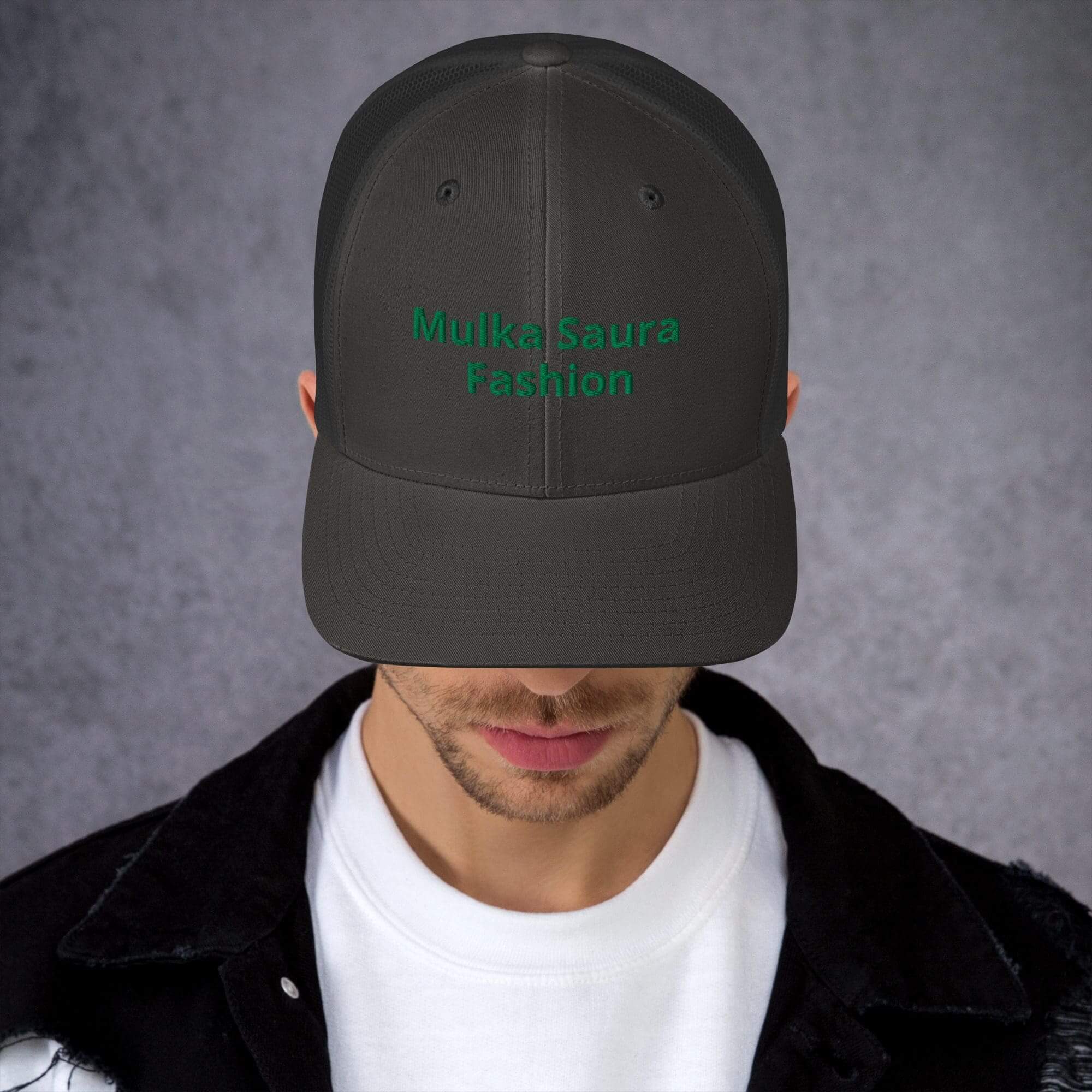 Dark baseball cap with green Mulka Saura logo