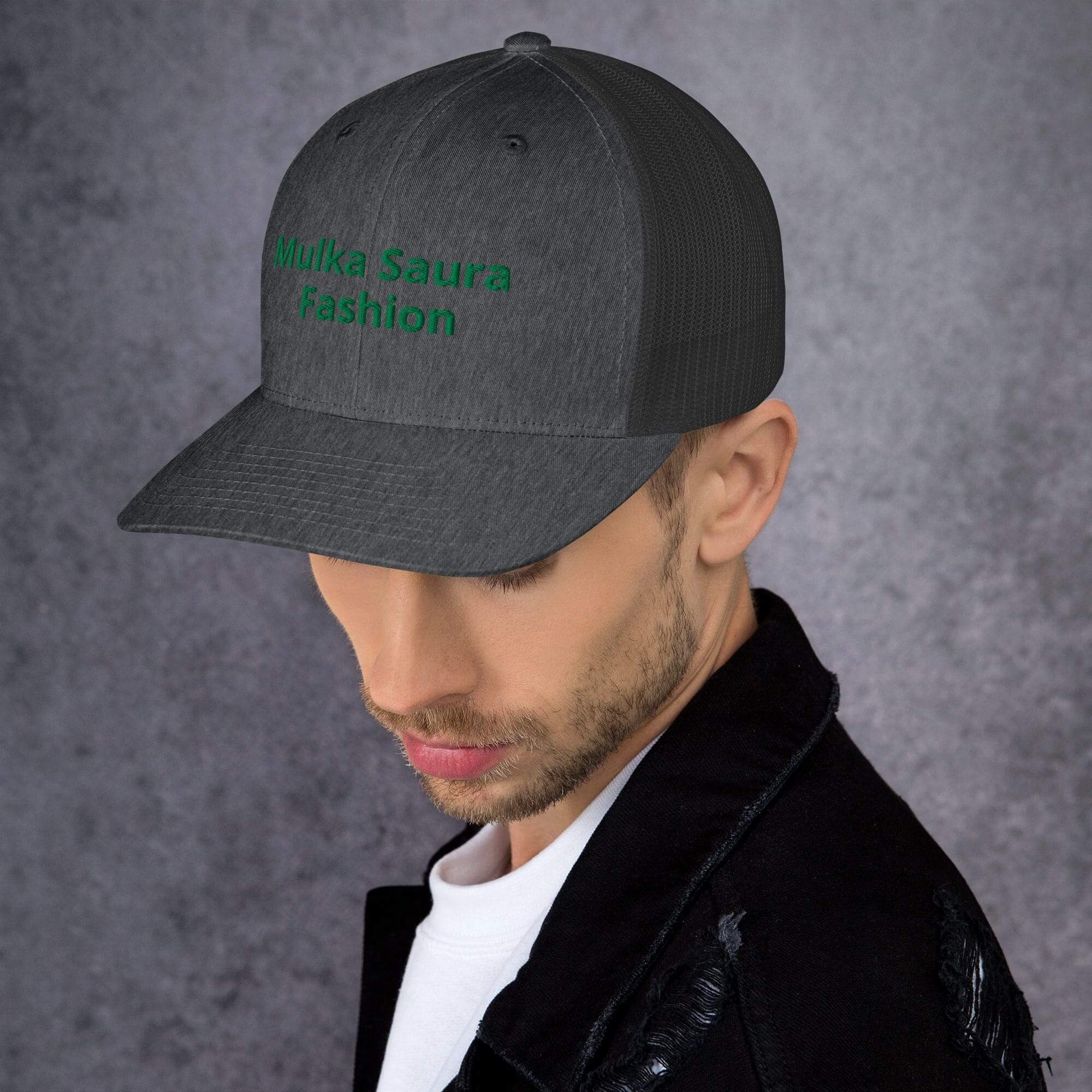 Man wearing gray cap and black jacket.