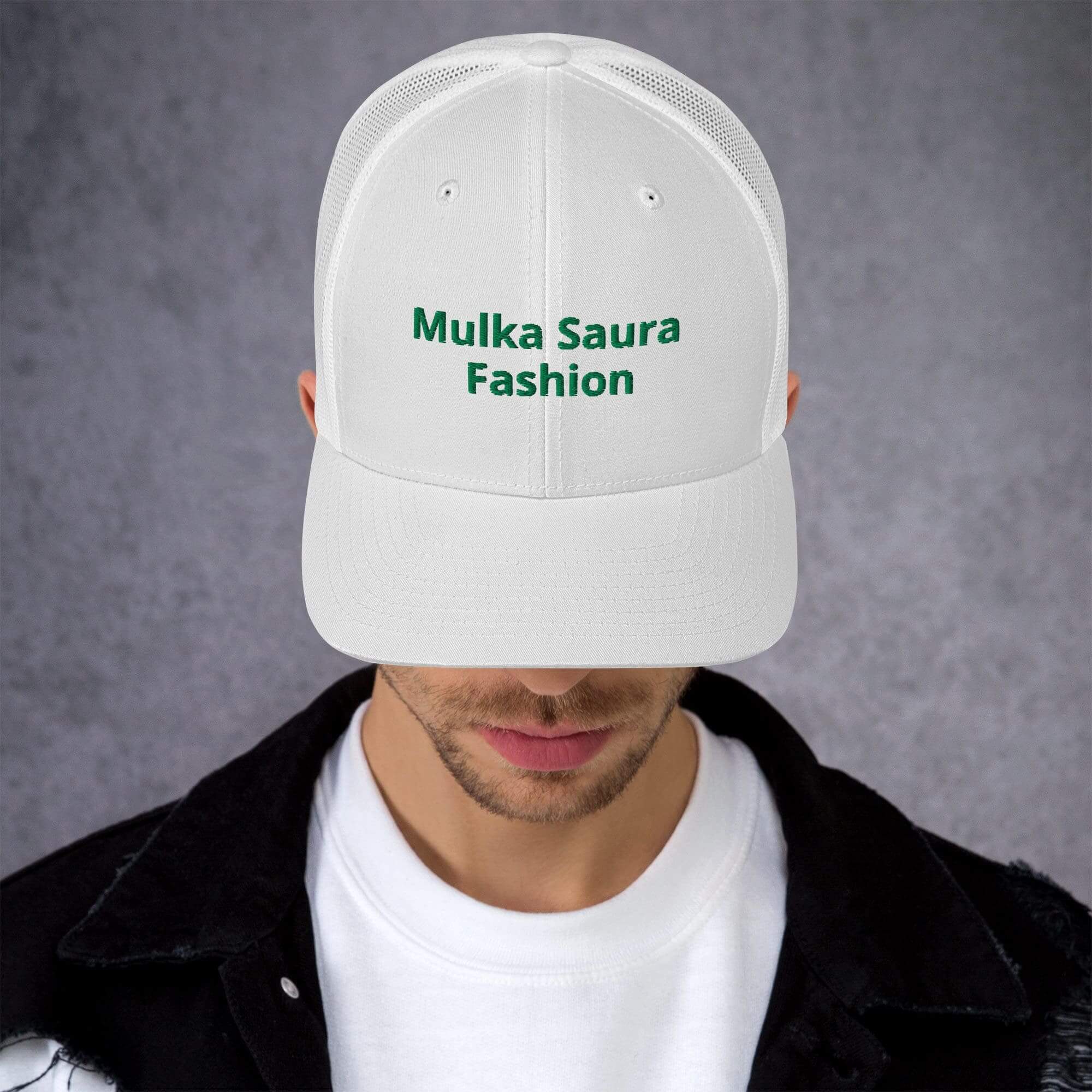 White cap with "Mulka Saura Fashion" logo.