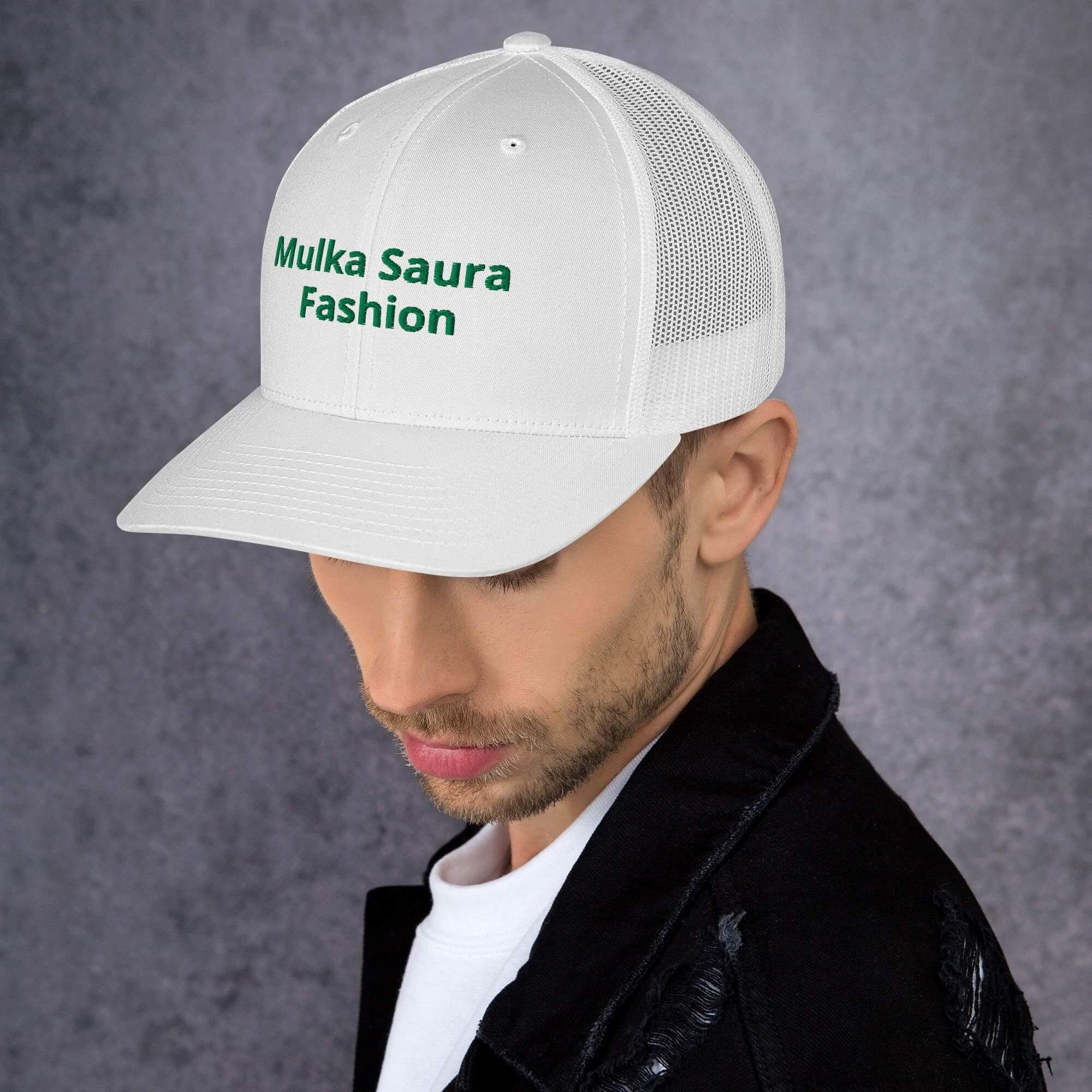Man wearing white cap, "Mulka Saura Fashion".