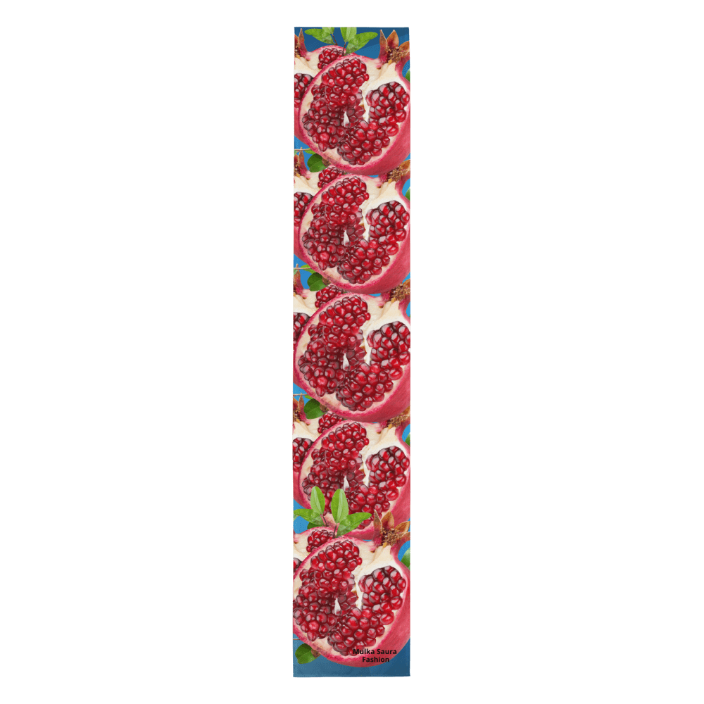 Pomegranate slices with seeds on blue background.
