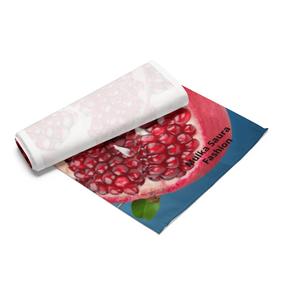 Rolled fabric with pomegranate print design.