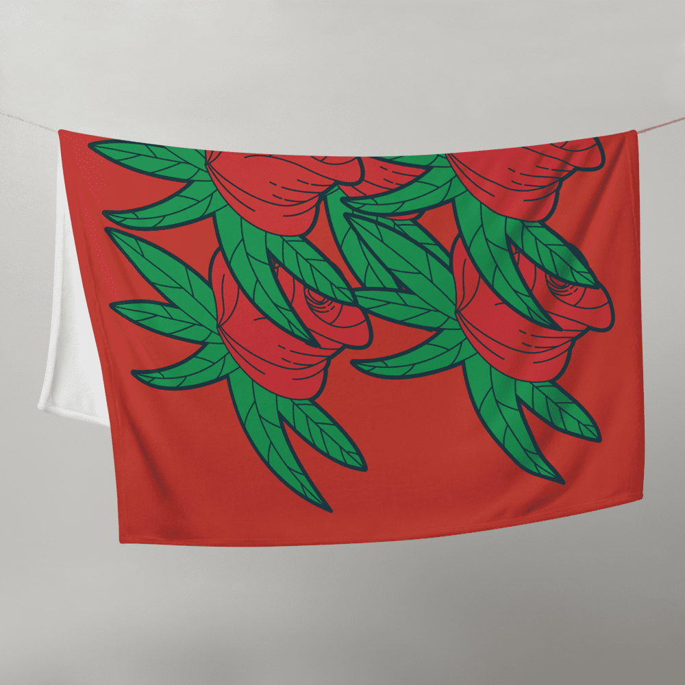 Red towel with green floral design.