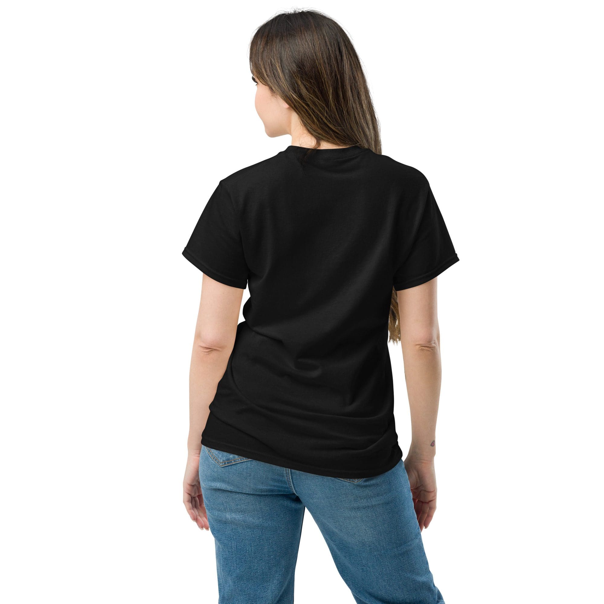 Woman in black shirt and jeans, back view.