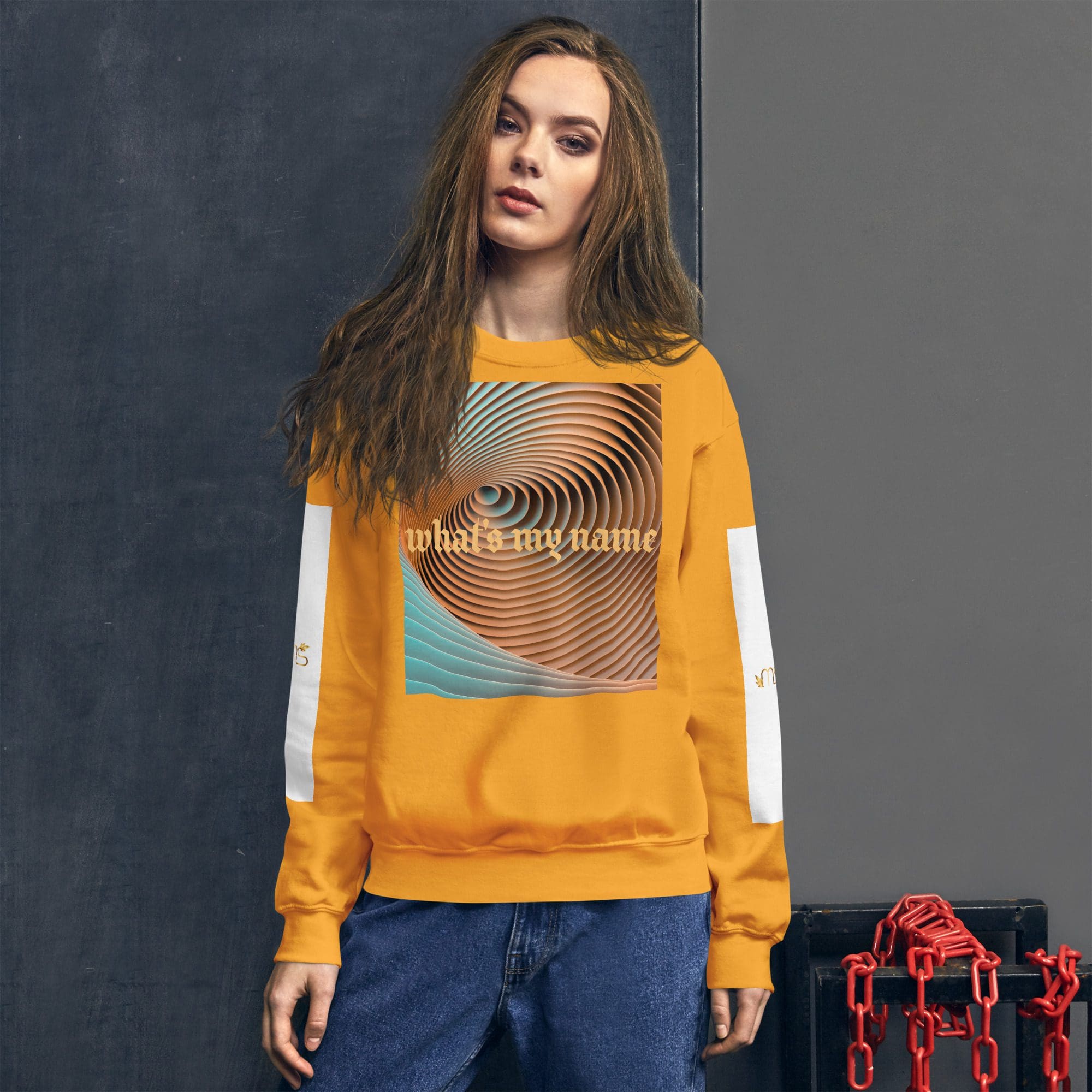 Woman wearing yellow sweatshirt with spiral design.