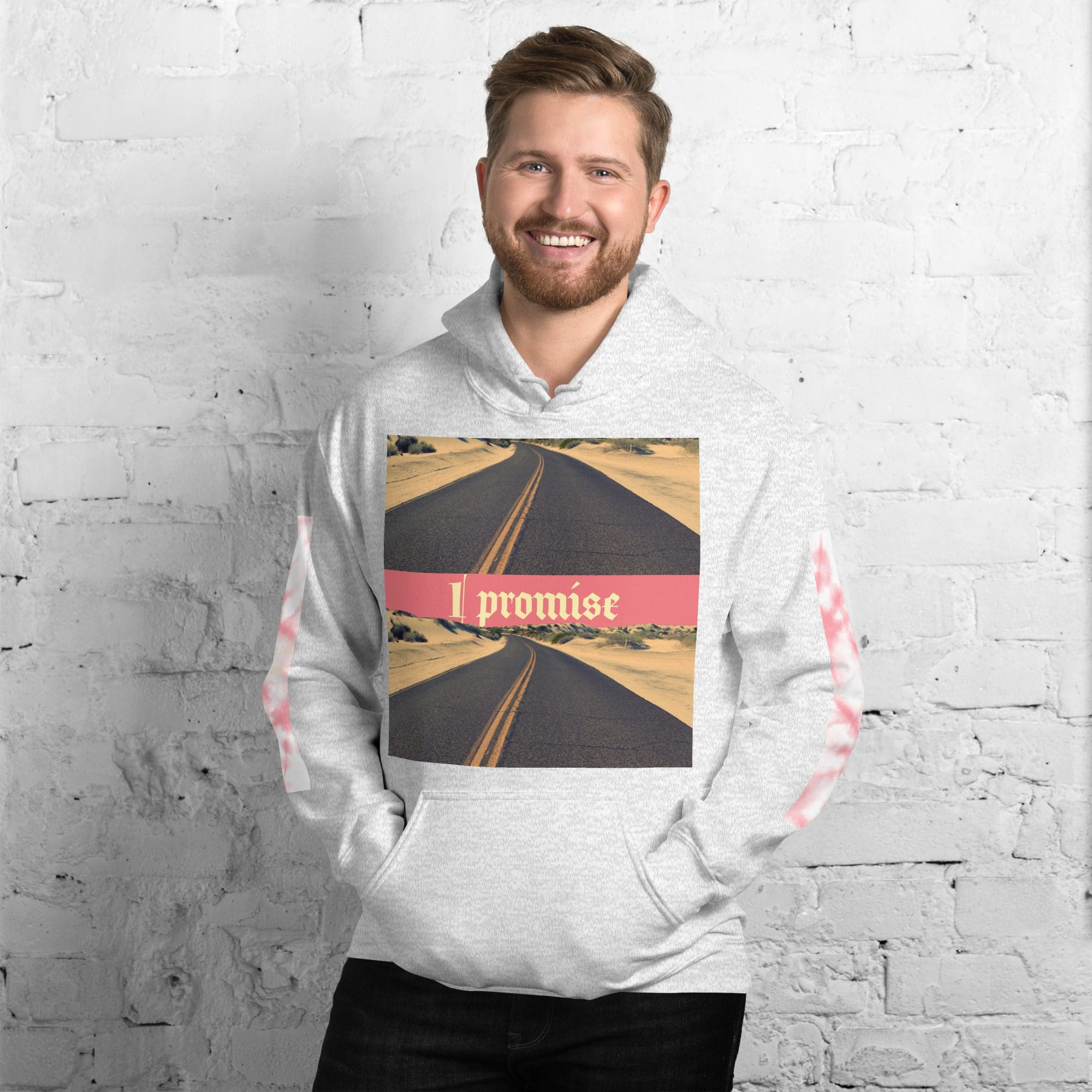 Smiling man wearing I promise road hoodie
