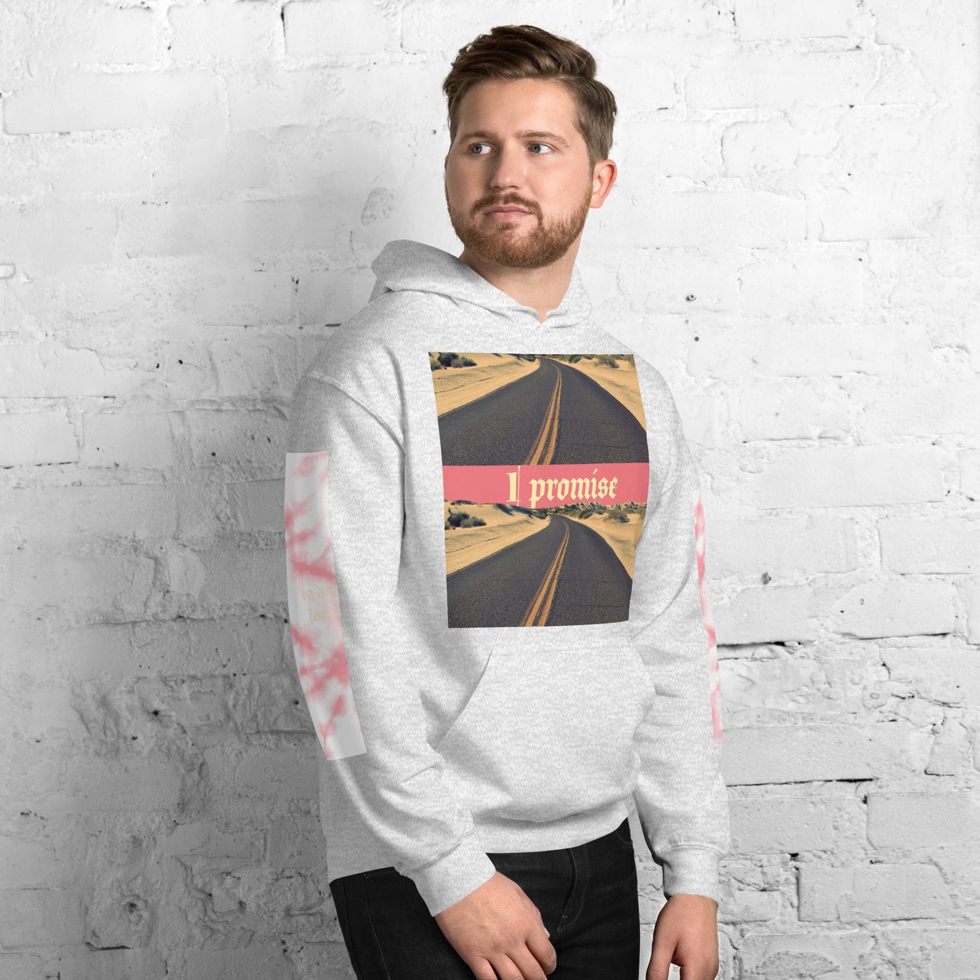 Man wearing hoodie with road graphic.