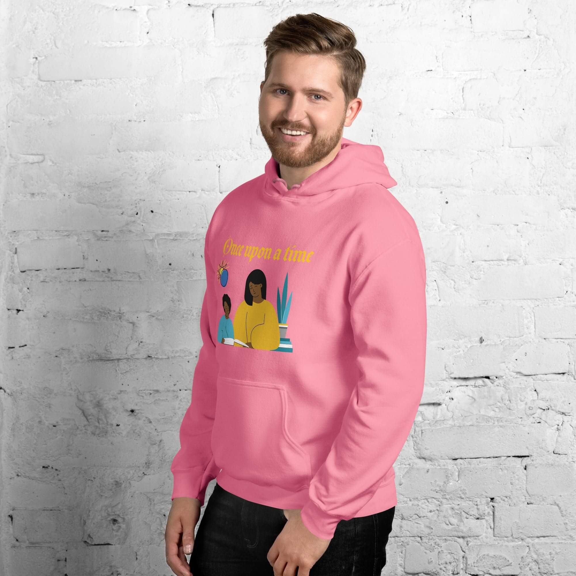 Smiling man in pink hoodie, white background.