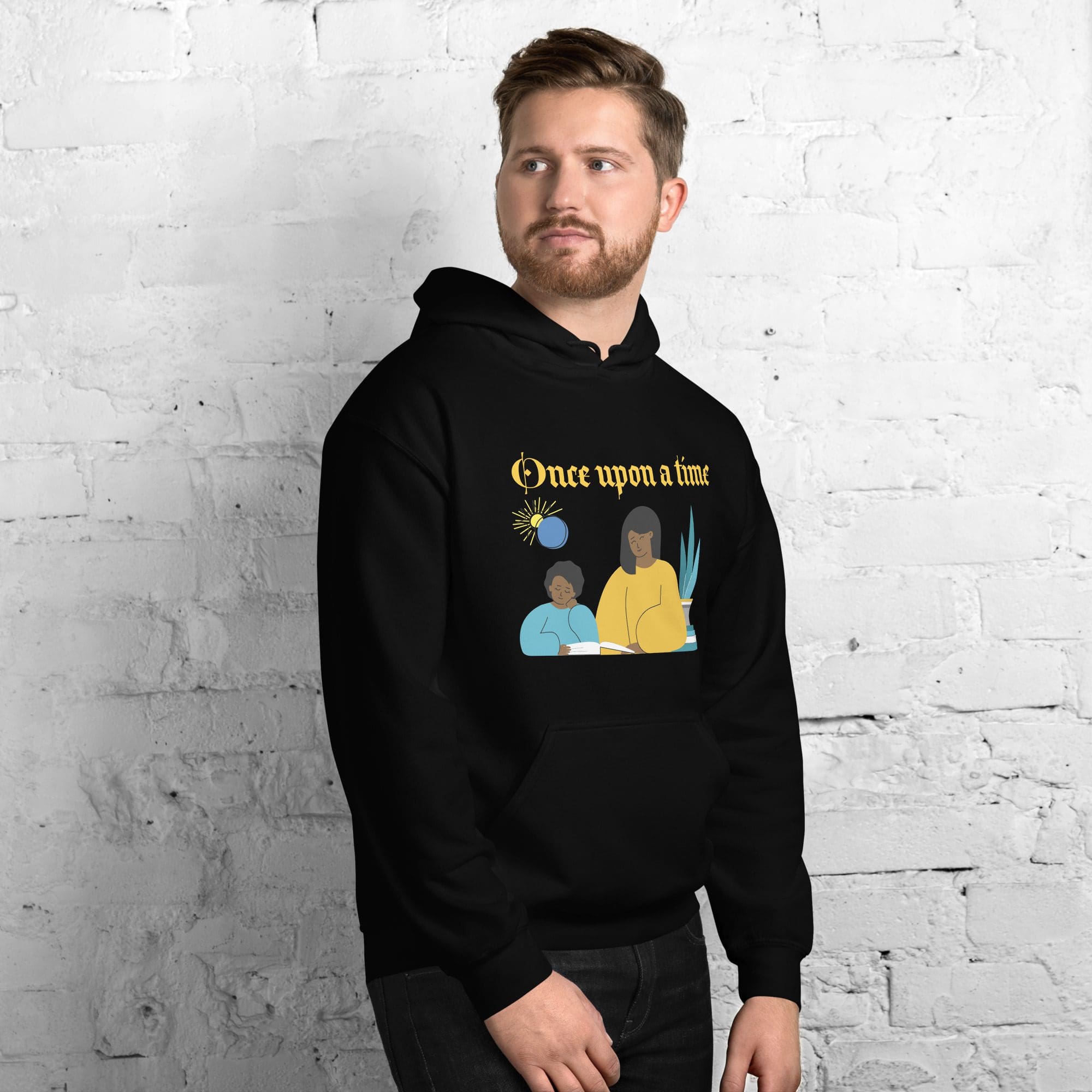 Man wearing black hoodie with graphic design.
