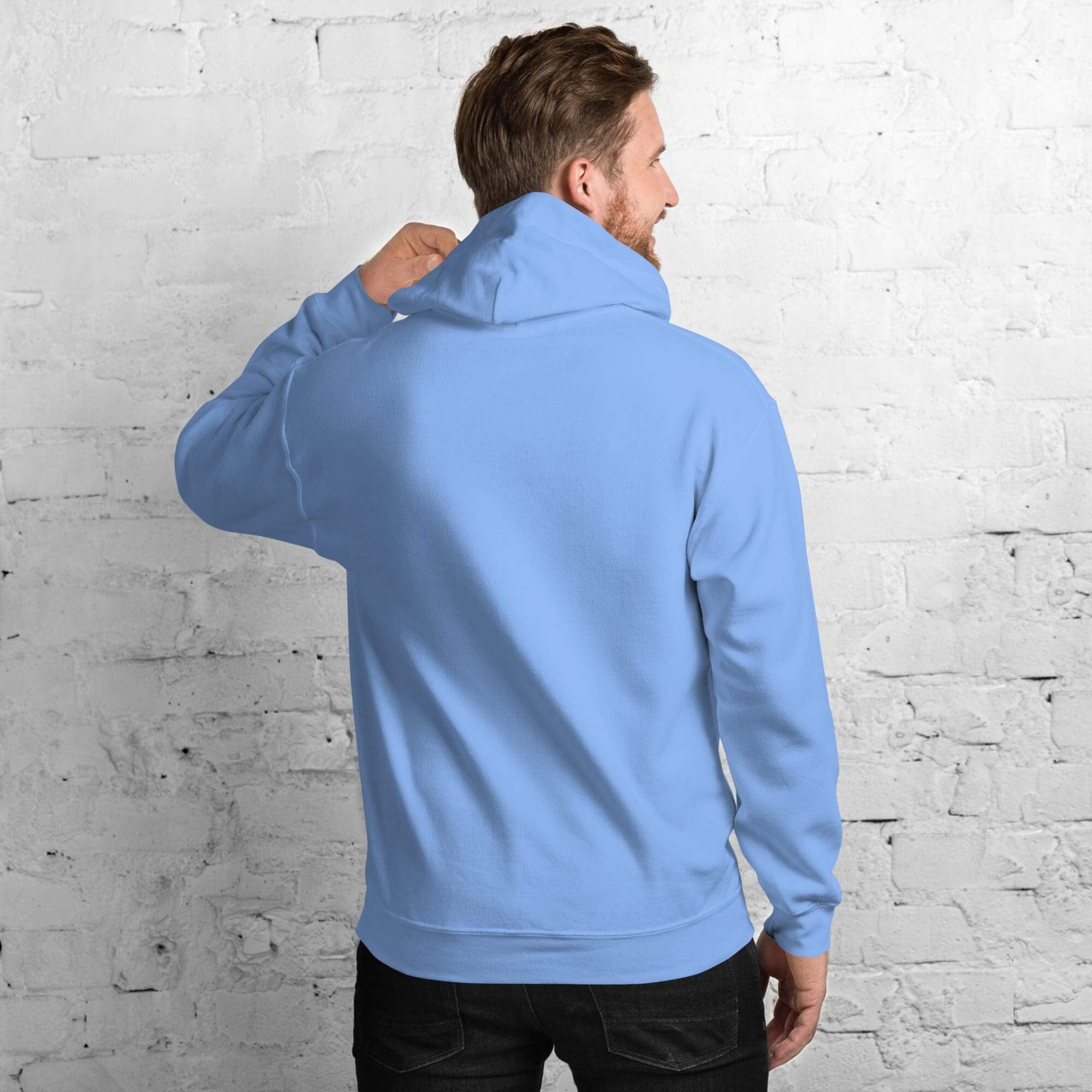 Man wearing light blue hoodie, facing away.