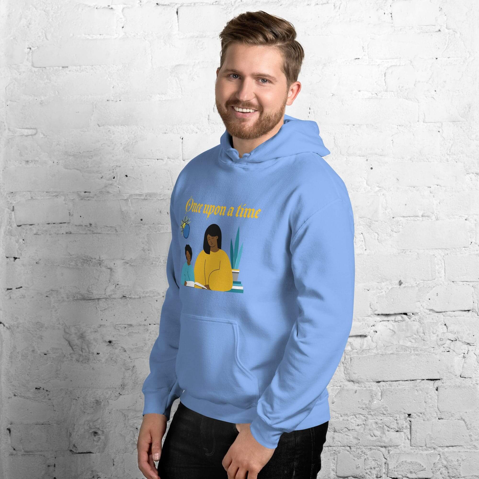 Smiling man in blue storybook hoodie