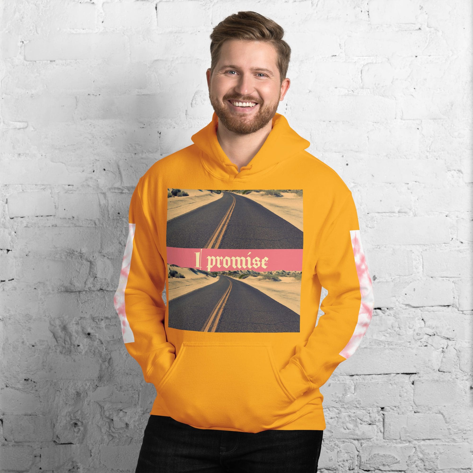 Man wearing orange hoodie with road graphic.