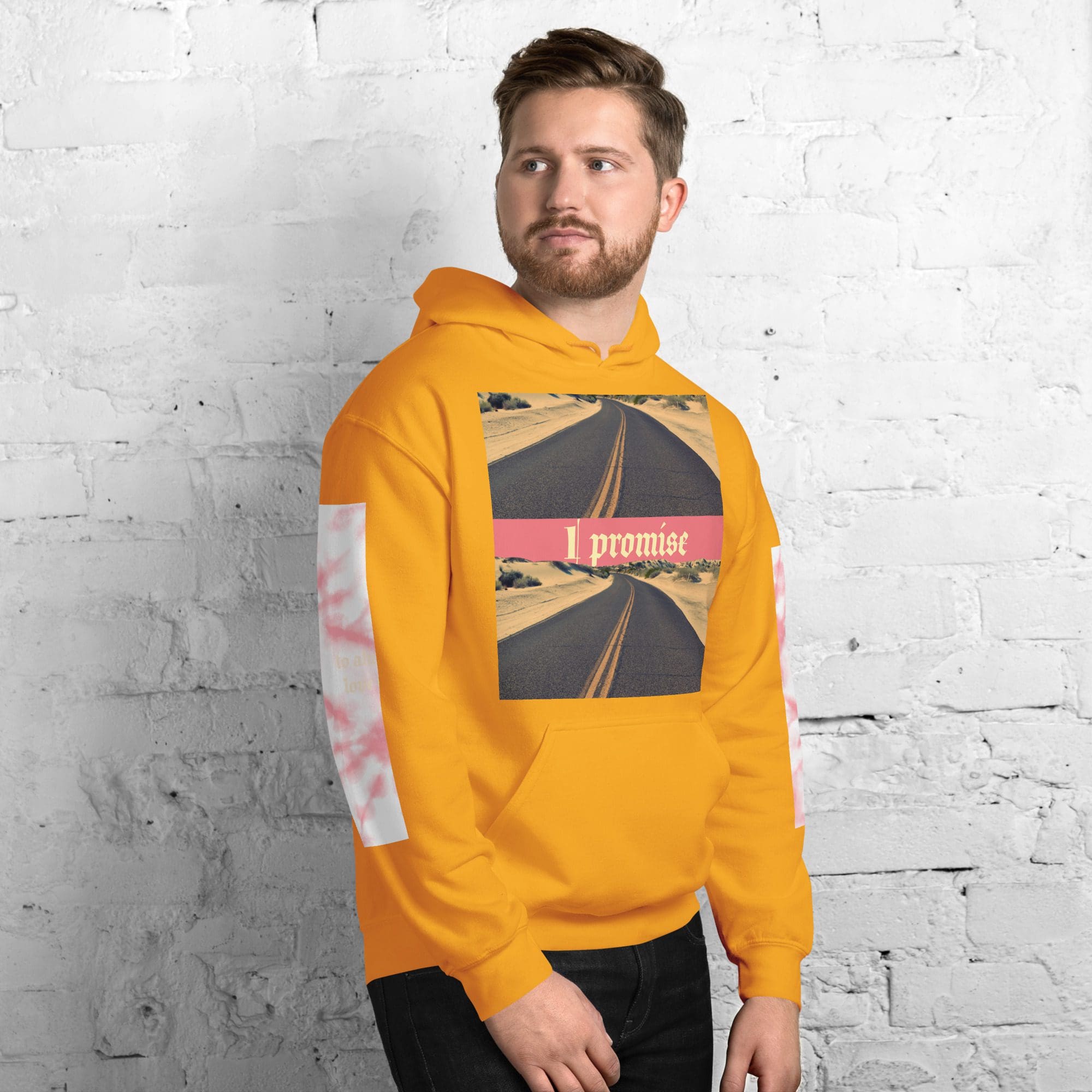 Man in orange hoodie featuring road graphic