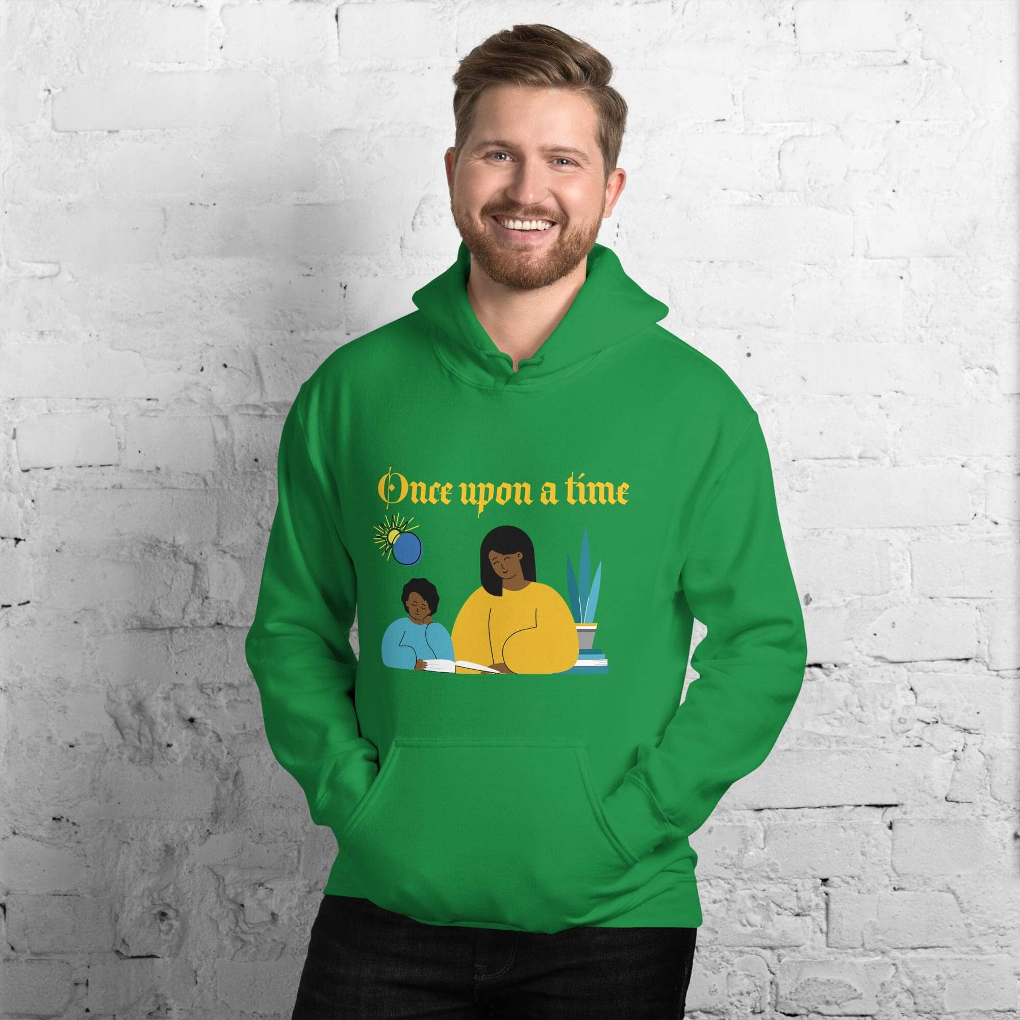 Man wearing green hoodie with illustrated design.