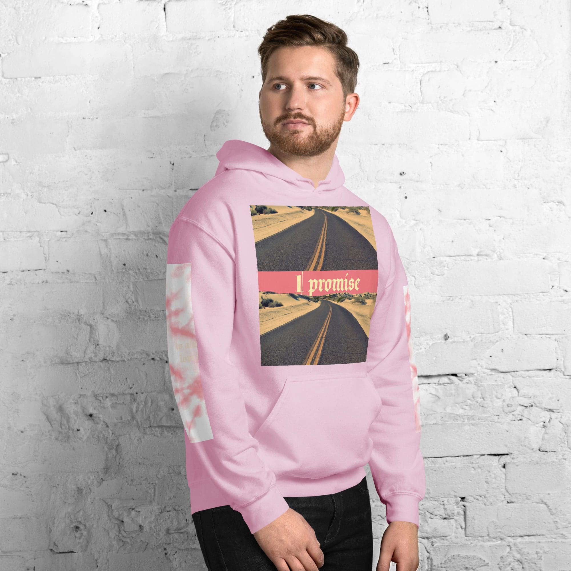 Man wearing a pink hoodie with print.
